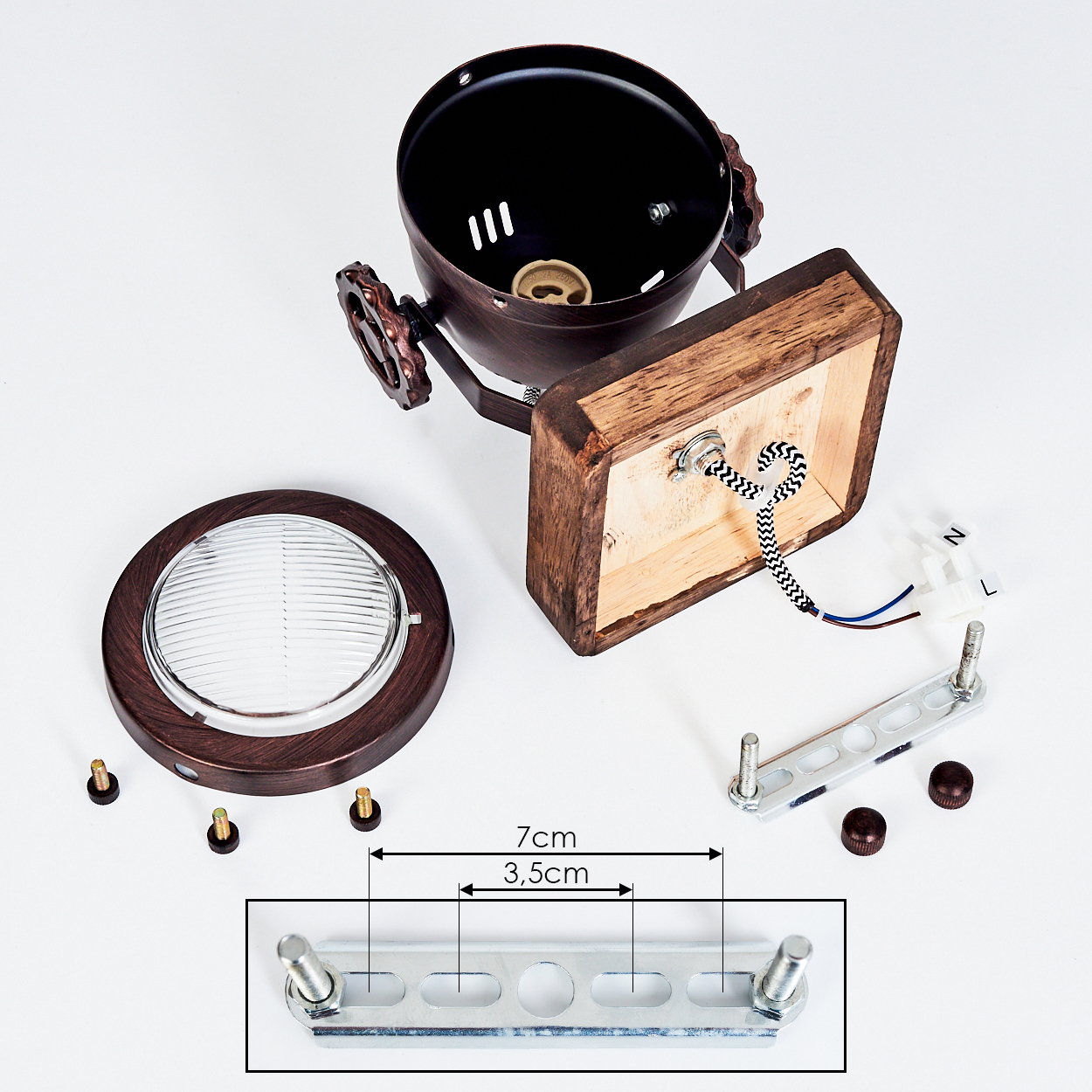 Teile einer Lampe: Holzsockel, Bronzeschirm, Glas und Montagezubehör.