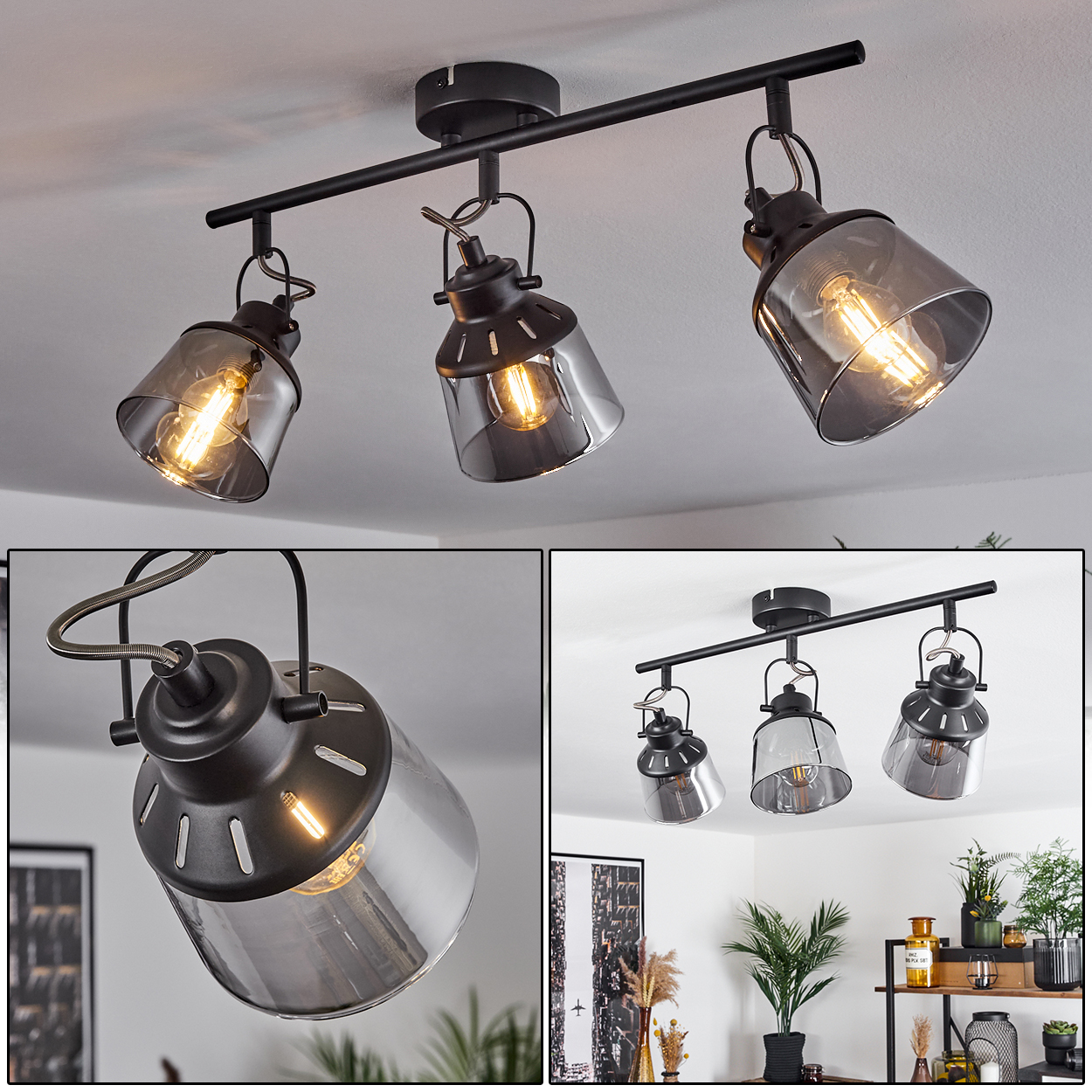 Drei schwarze Lampen mit Rauchglas-Schirmen an einer Deckenstange.