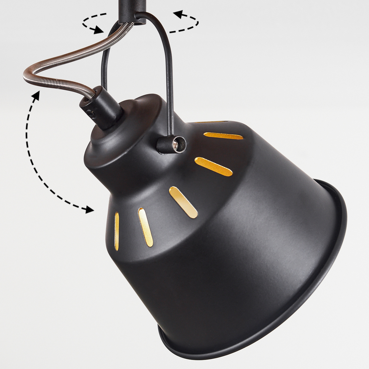 Schwarze Lampe mit verstellbarem Gelenkarm und goldenen Schlitzen im Lampenschirm.