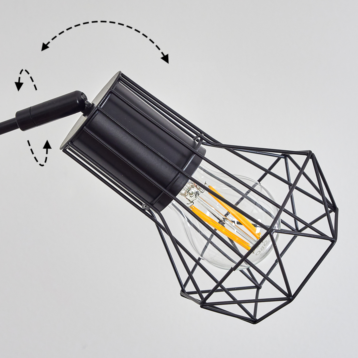 Eine schwarze Lampe mit Drahtkäfig, Glühbirne und Pfeilen, die die Bewegung anzeigen.