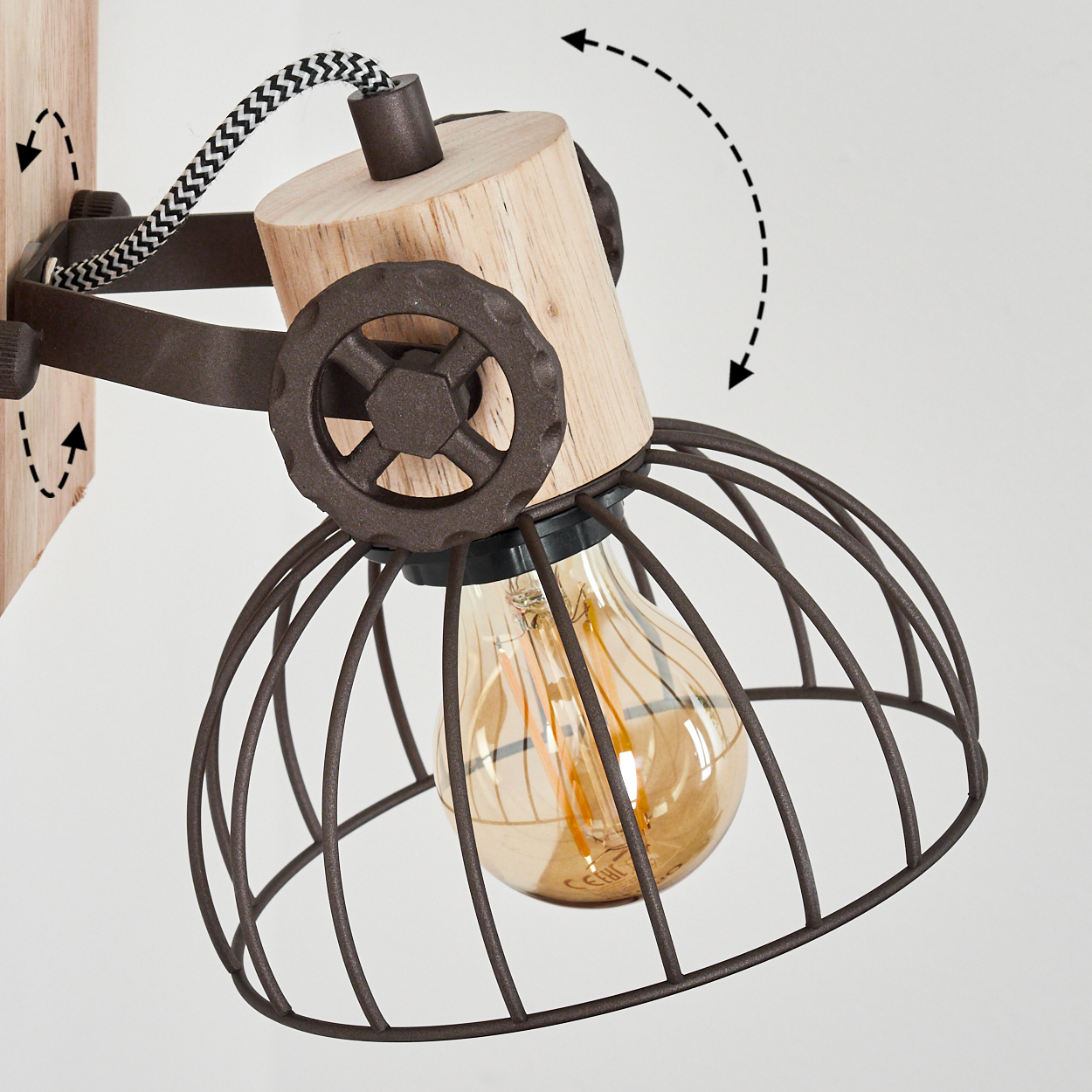 Industrielle Wandleuchte mit Holzelementen, Metallkäfig und Glühbirne.
