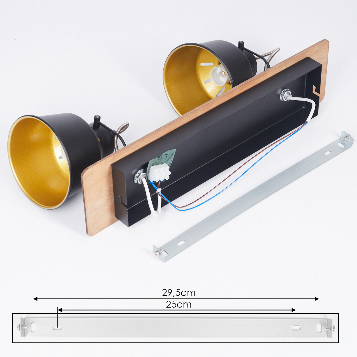 Schwarz-goldene Lampe mit Holzbefestigung und Metallhalterung.