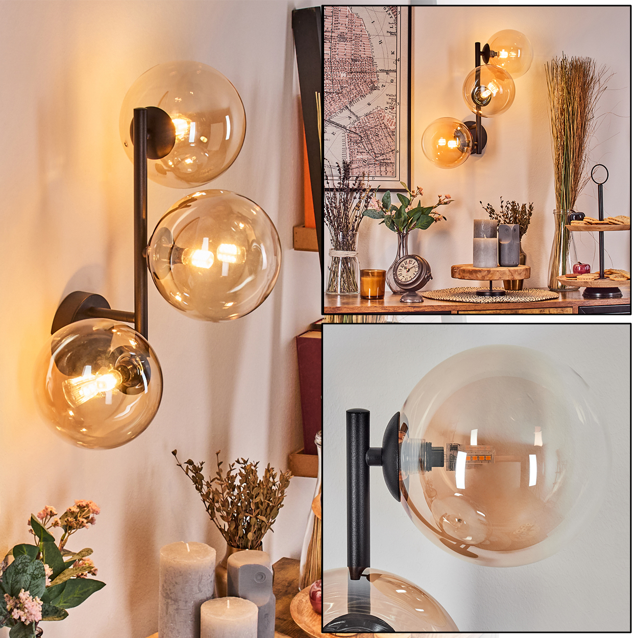 Eine Wandleuchte mit drei bernsteinfarbenen Glaskugeln und schwarzem Metallgestell.