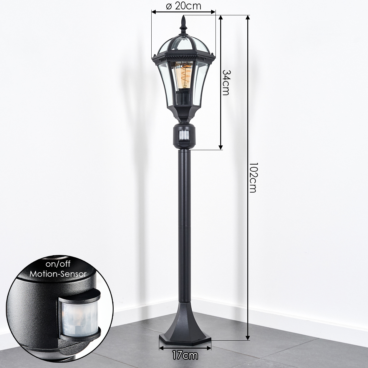 Schwarze Außenlampe mit Bewegungssensor, 102cm hoch, 20cm Durchmesser.
