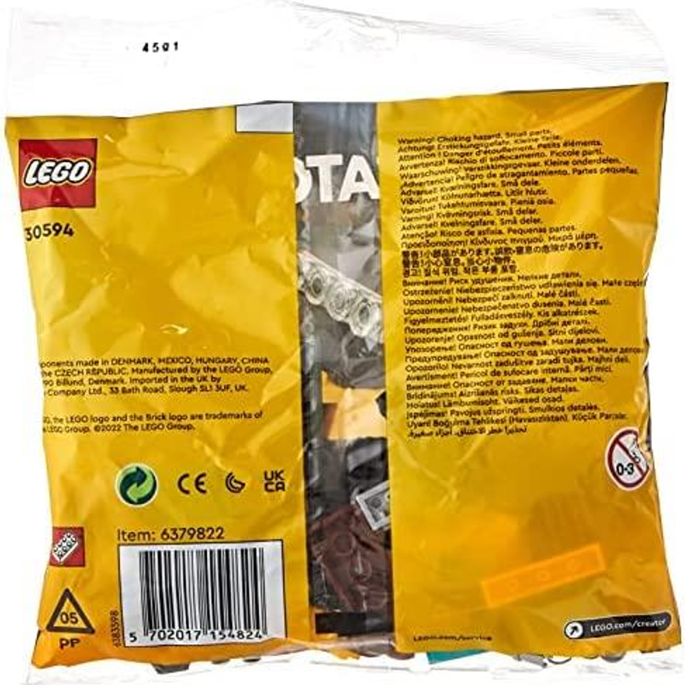 Confezione di un set LEGO con avvisi e informazioni sul prodotto.