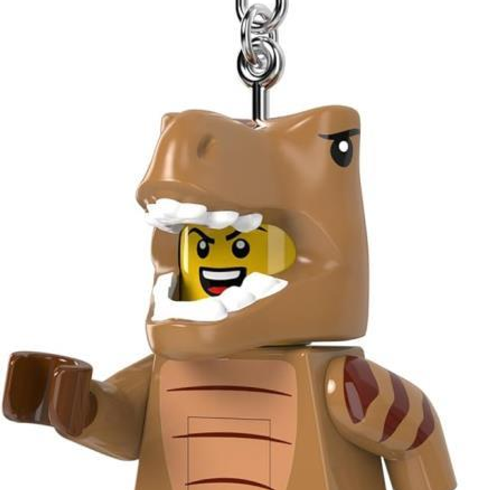 Ağzında sarı Lego kafası olan kahverengi Lego dinozor anahtarlık.