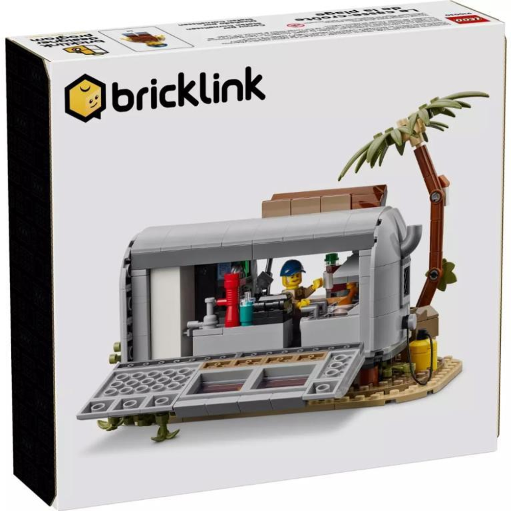 Food truck Lego z palmami i postaciami w scenerii plażowej.