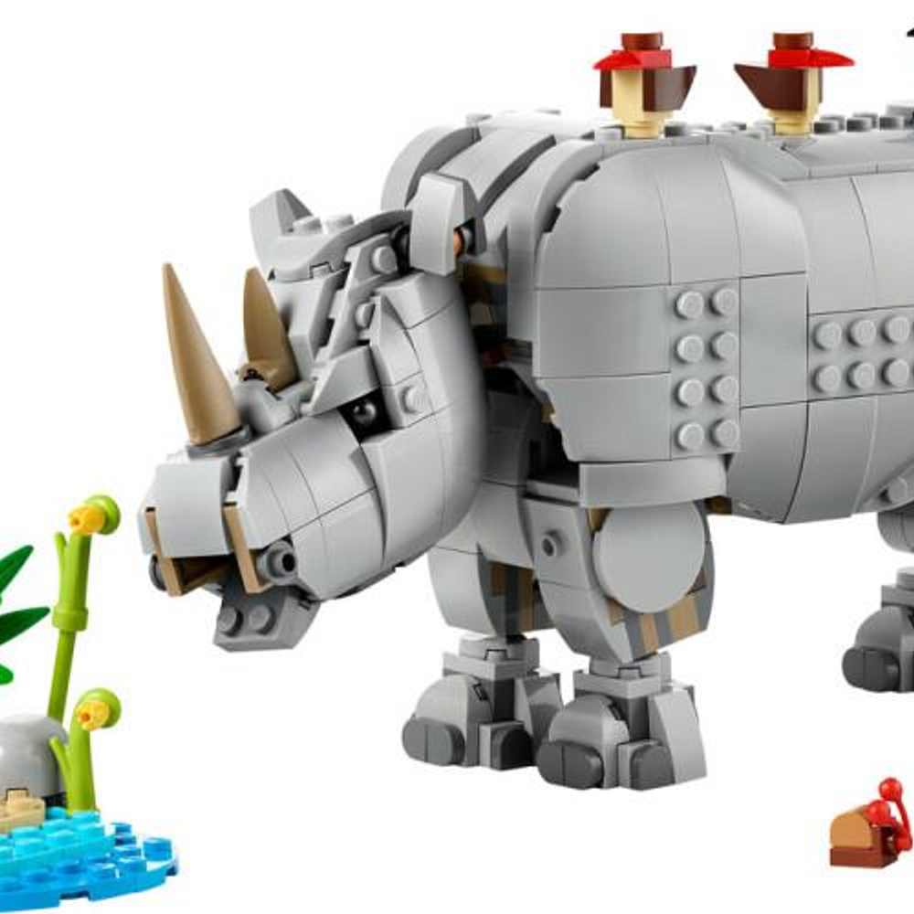 Un rinoceronte grigio Lego con corna marroni e accenti rossi sul dorso.