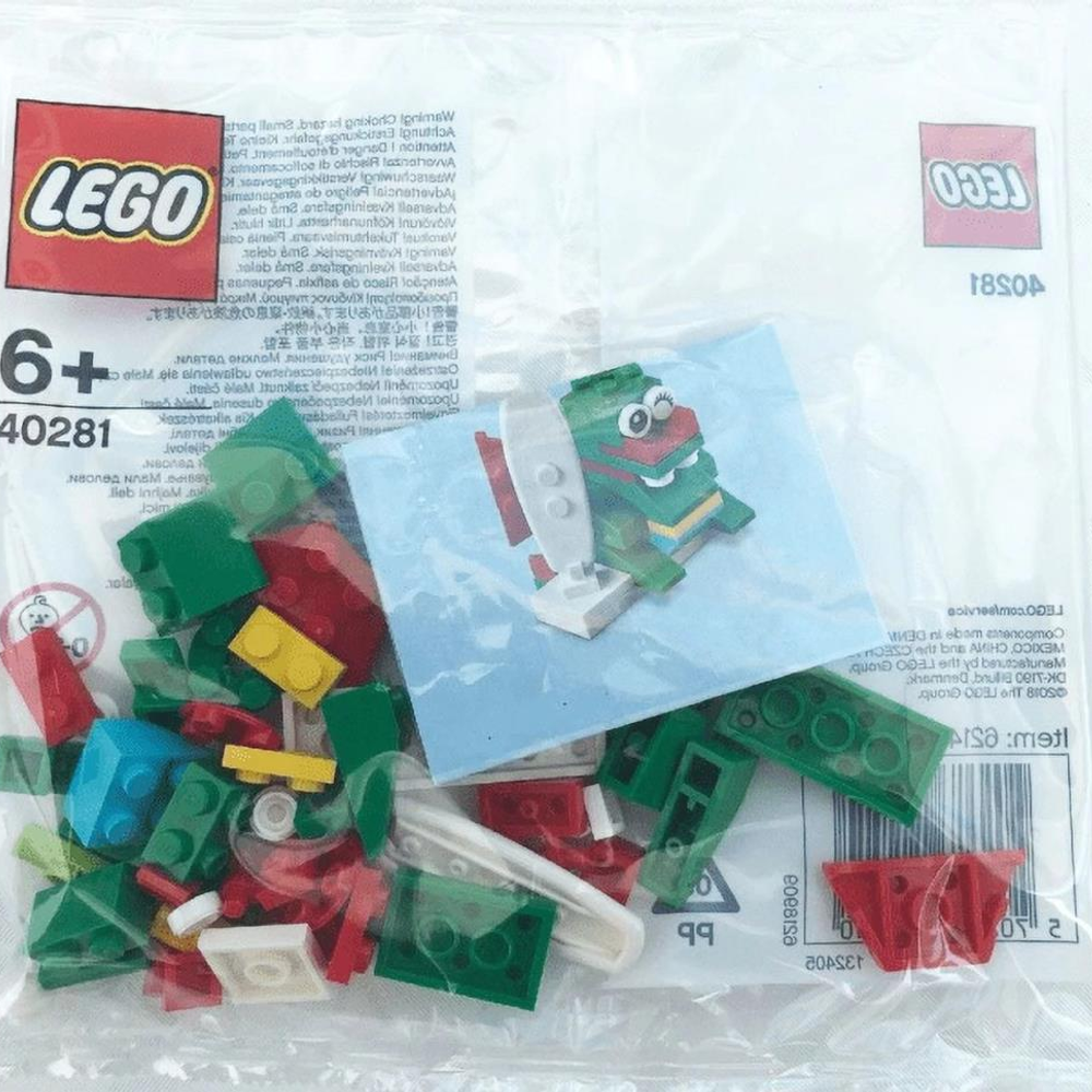 Yeşil ve kırmızı tuğlalı ve küçük bir ejderha figürlü LEGO 40281 seti.