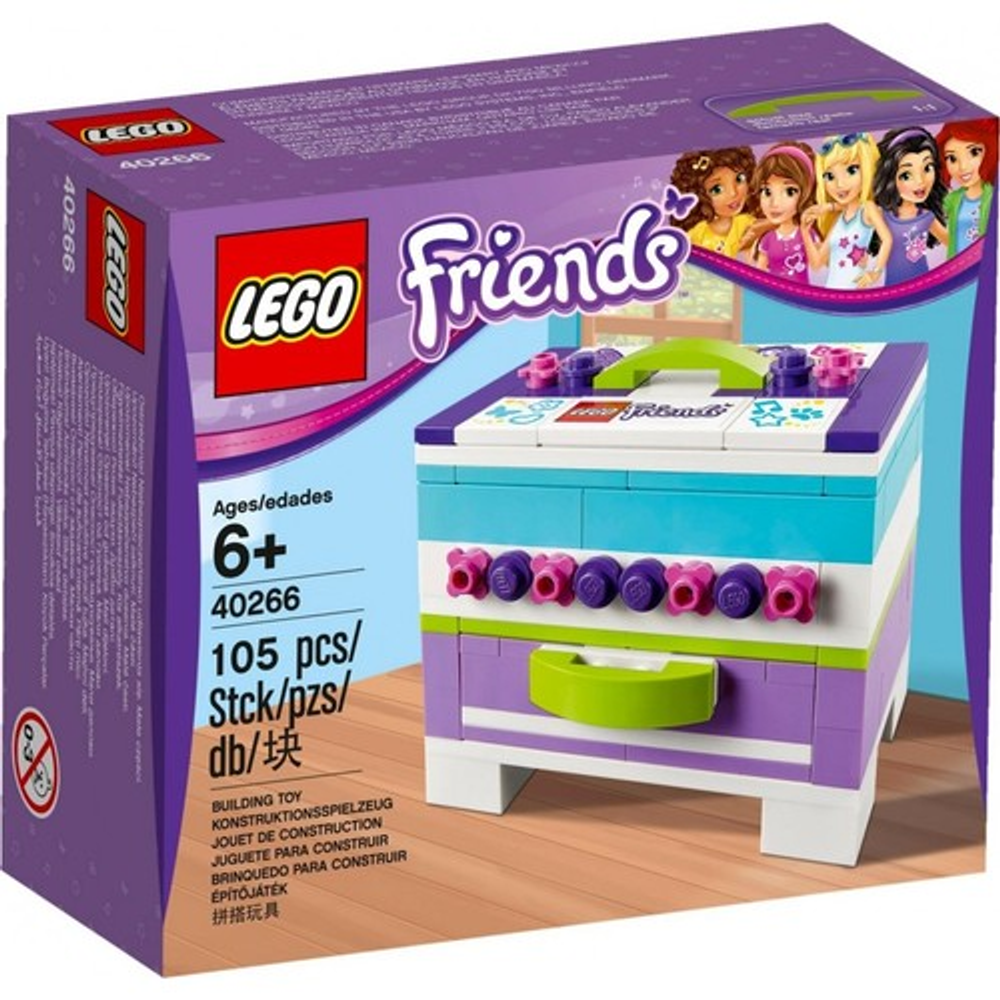 Renkli bir şifonyer ve kutudaki Lego figürlerini içeren Lego Friends yapım seti.