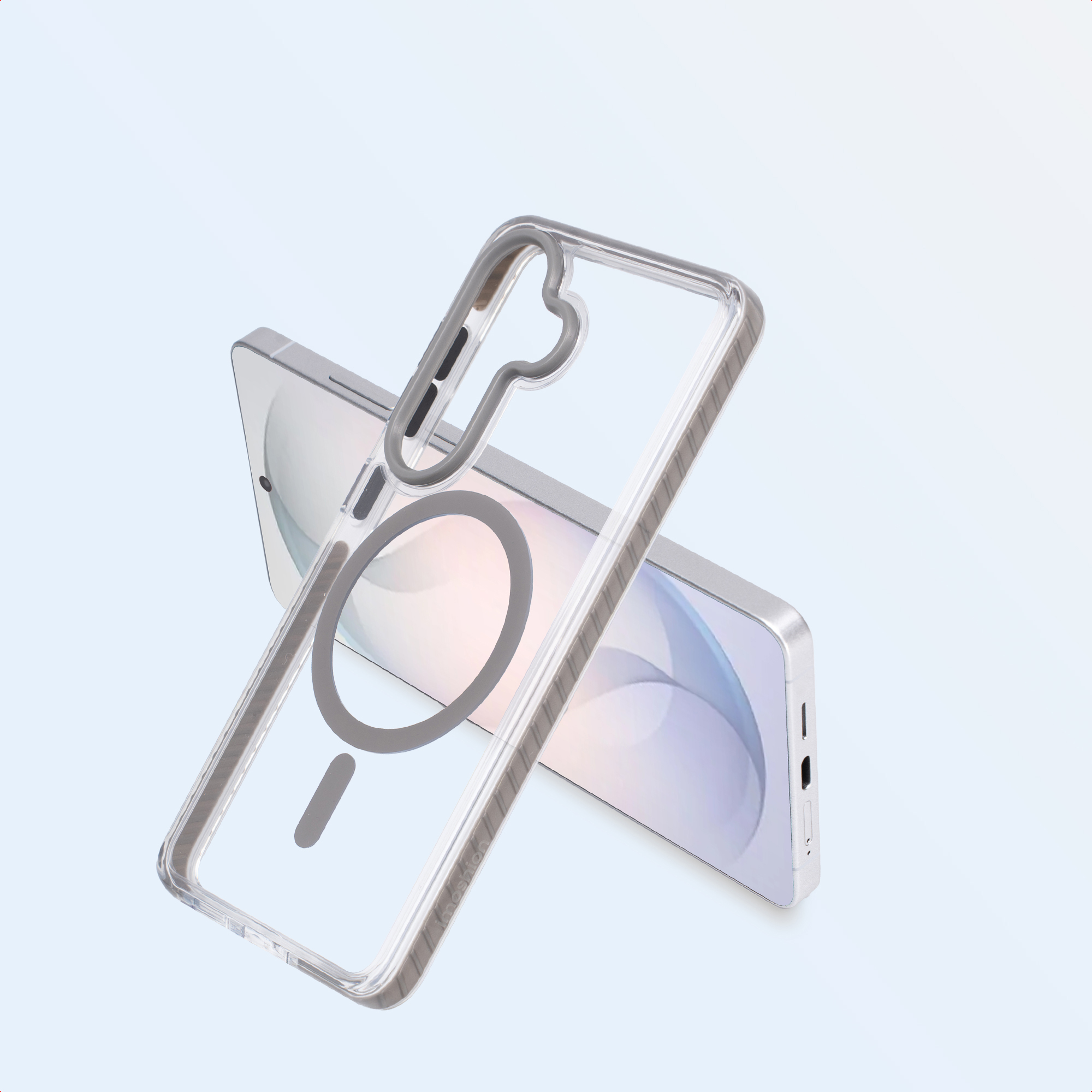 Een transparante telefoonhoes met magneetring ligt op een smartphone.
