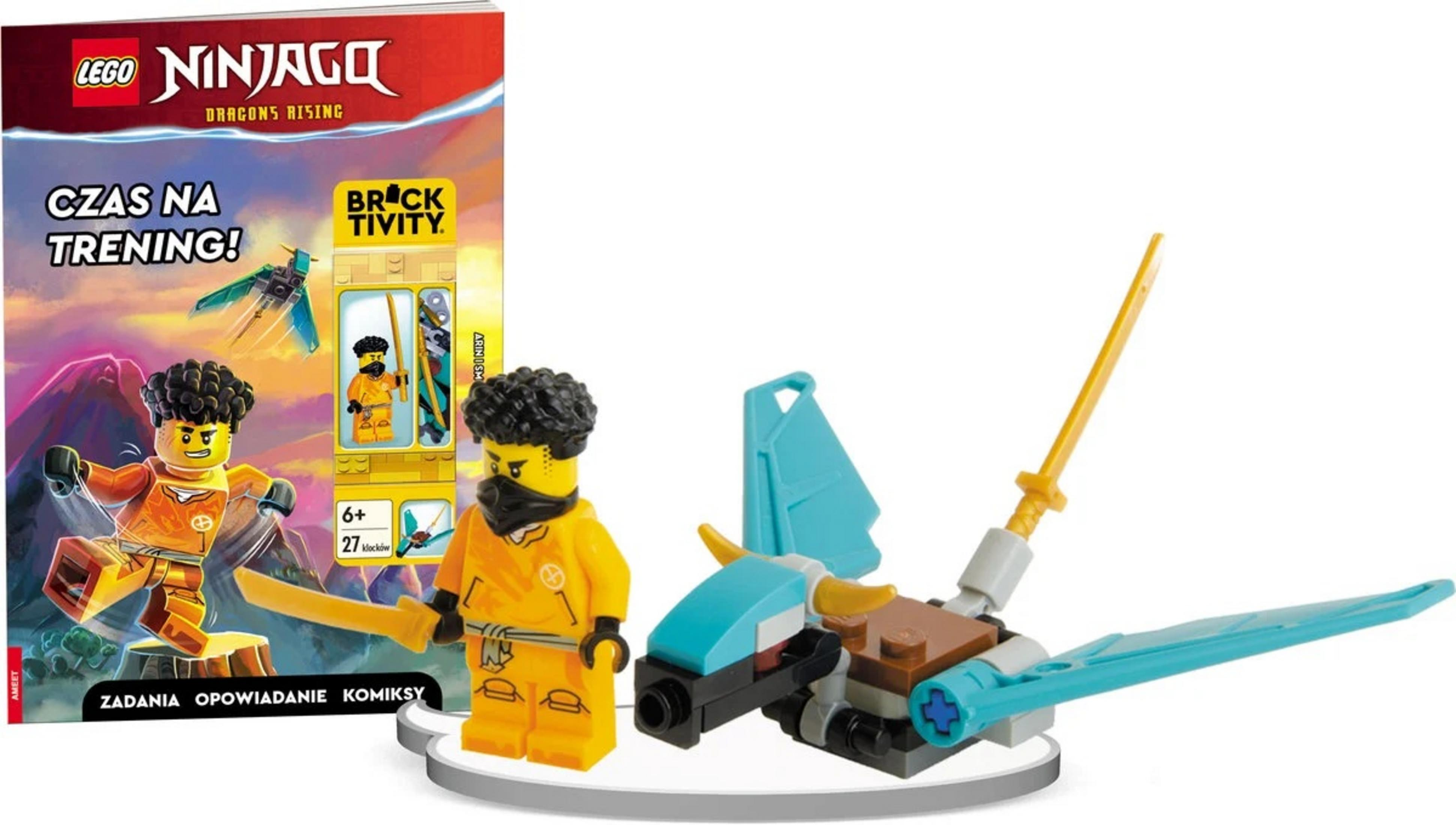 Książka Ninjago z minifigurką i małym latającym obiektem.
