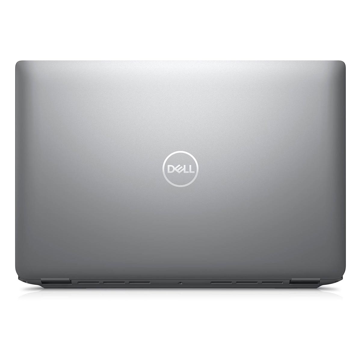 Zamknięty srebrny laptop Dell z logo pośrodku.