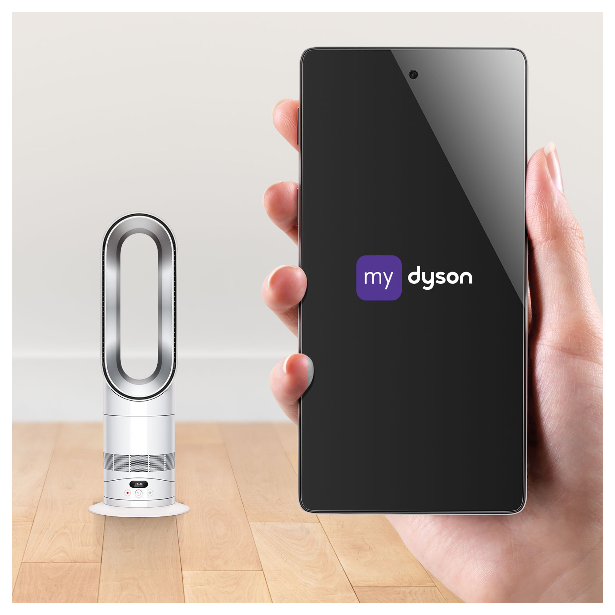 Un ventilatore Dyson accanto a uno smartphone con l'app Dyson.