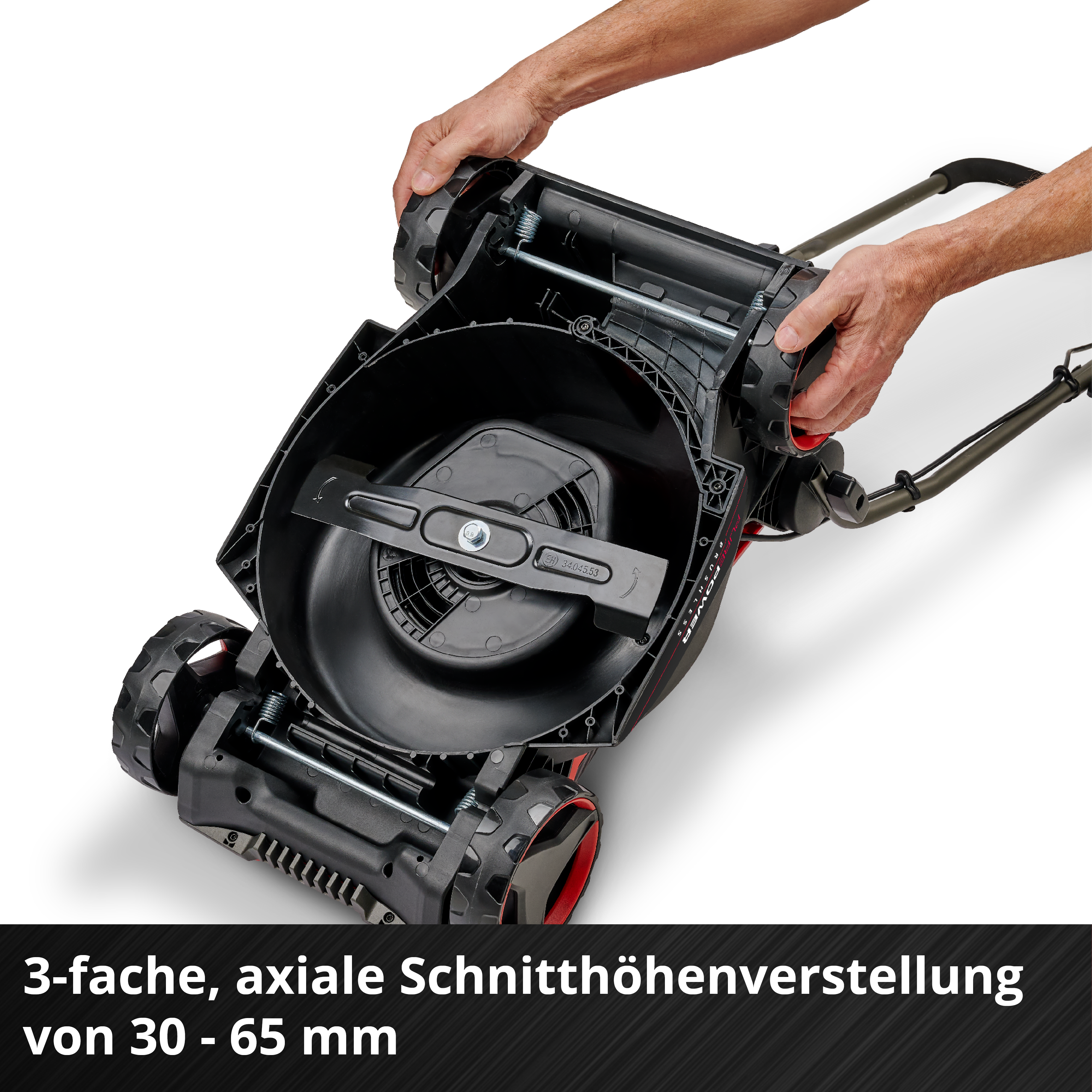 Hände passen die Schnitthöhe eines Rasenmähers an. Rot-schwarzes Design.