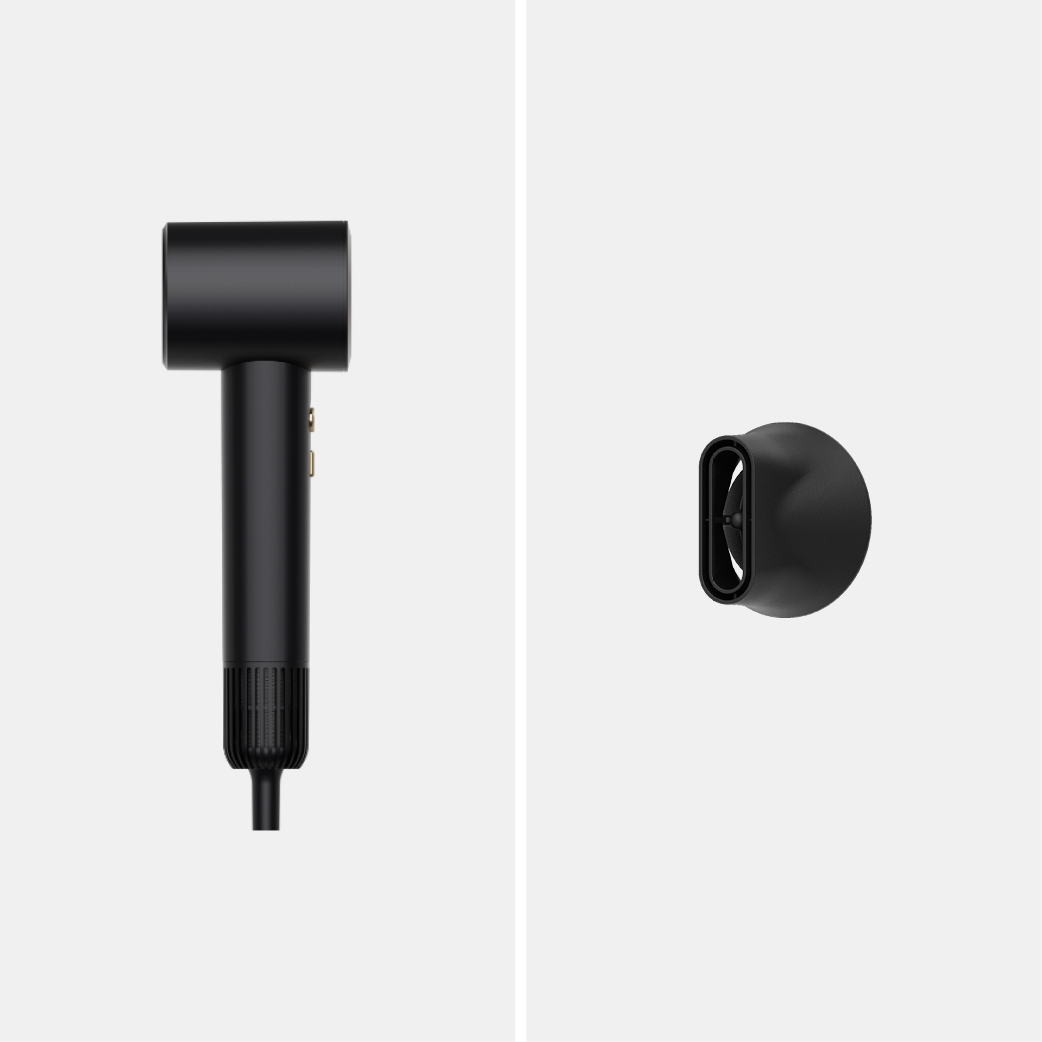 Black hairdryer with nozzle attachment on a gray background.