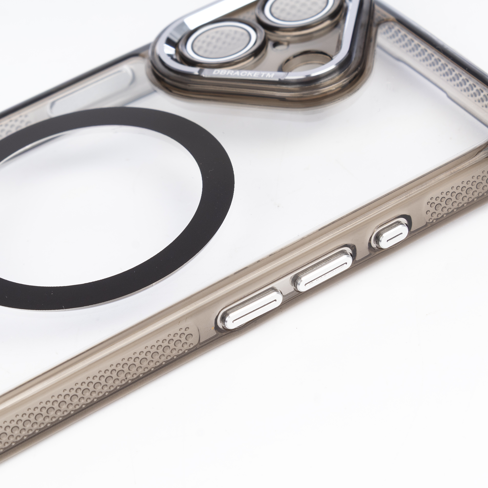 Custodia trasparente per telefono con anello magnetico e pulsanti argentati.