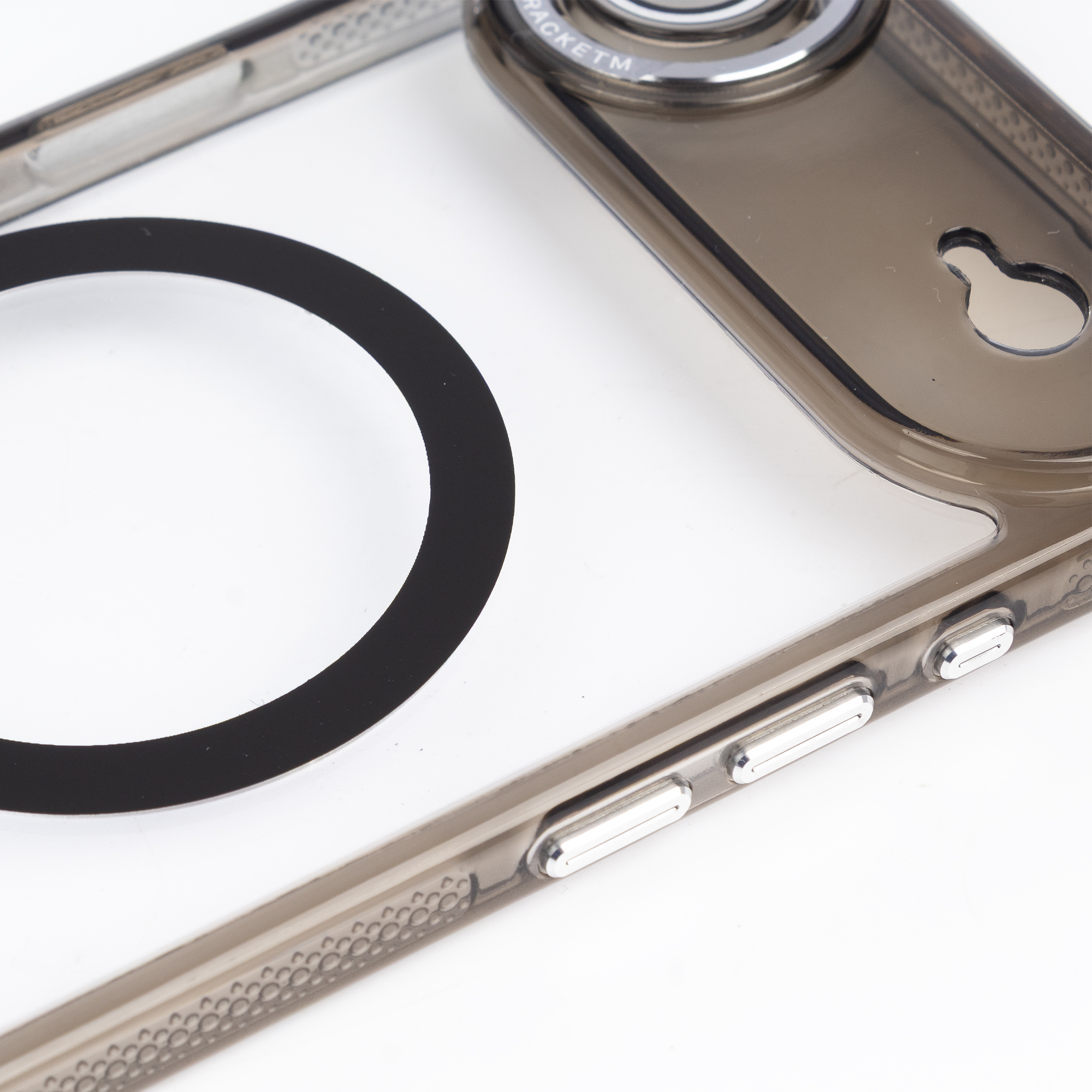 Custodia trasparente per telefono con anello nero e pulsanti argentati.