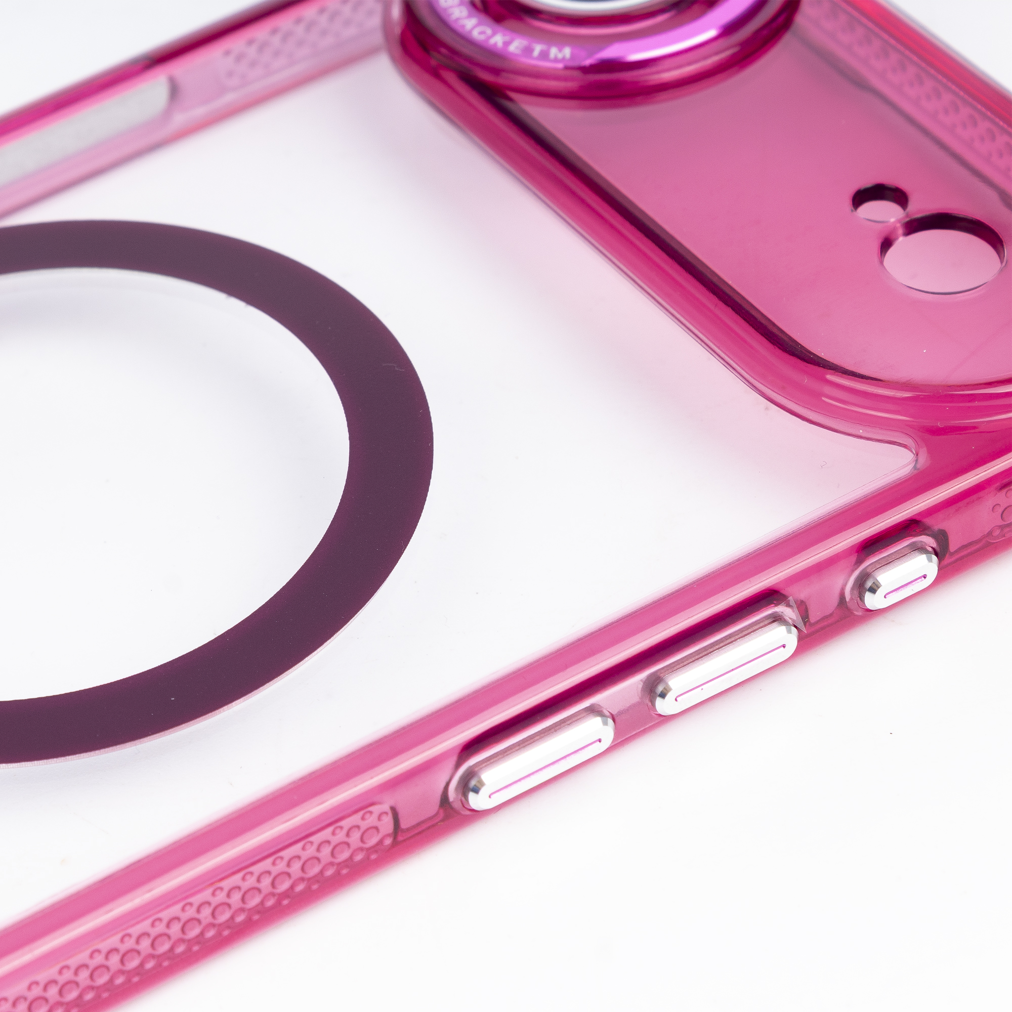 Custodia rosa trasparente per telefono con pulsanti argentati e dettaglio cerchio scuro.