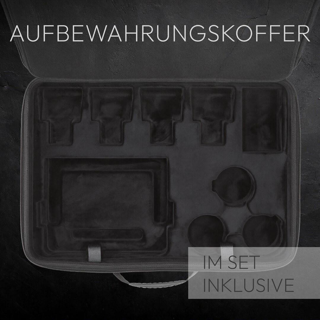 Ein leerer schwarzer Koffer mit geformten Fächern für Gegenstände.