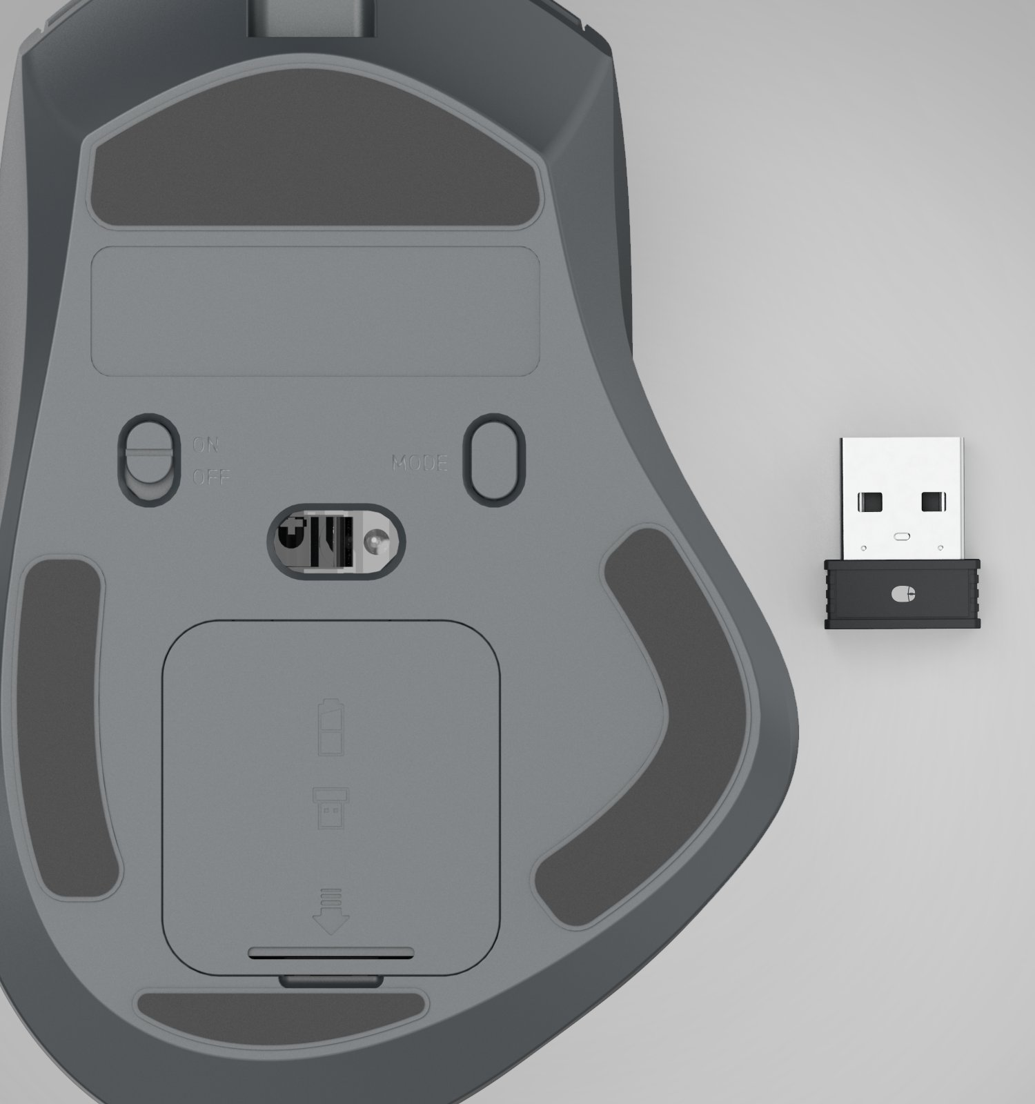 Parte inferiore di un mouse grigio con dongle USB accanto.