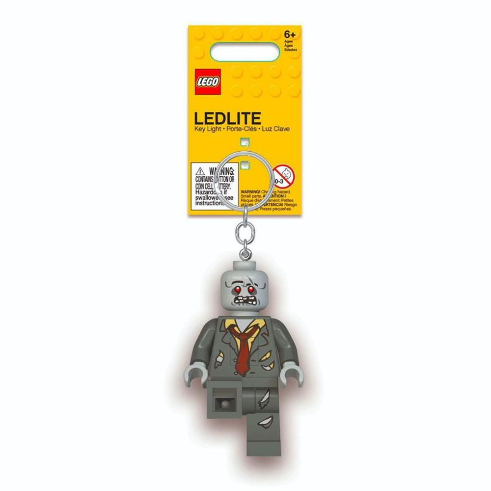 Sarı ambalajlı LEGO zombi anahtarlığı, LED ışıklı.