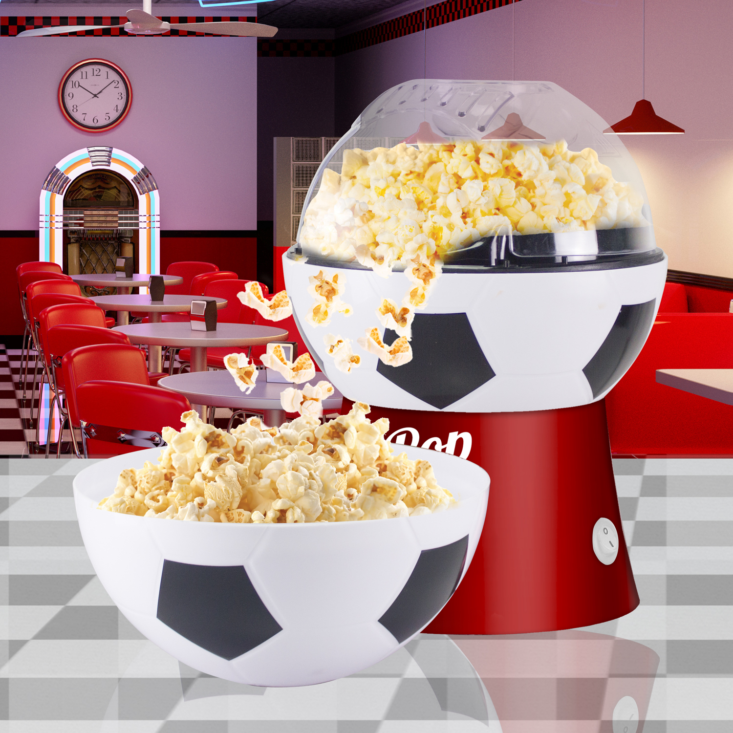 Una macchina per popcorn a forma di pallone da calcio accanto a una ciotola di popcorn in un diner.