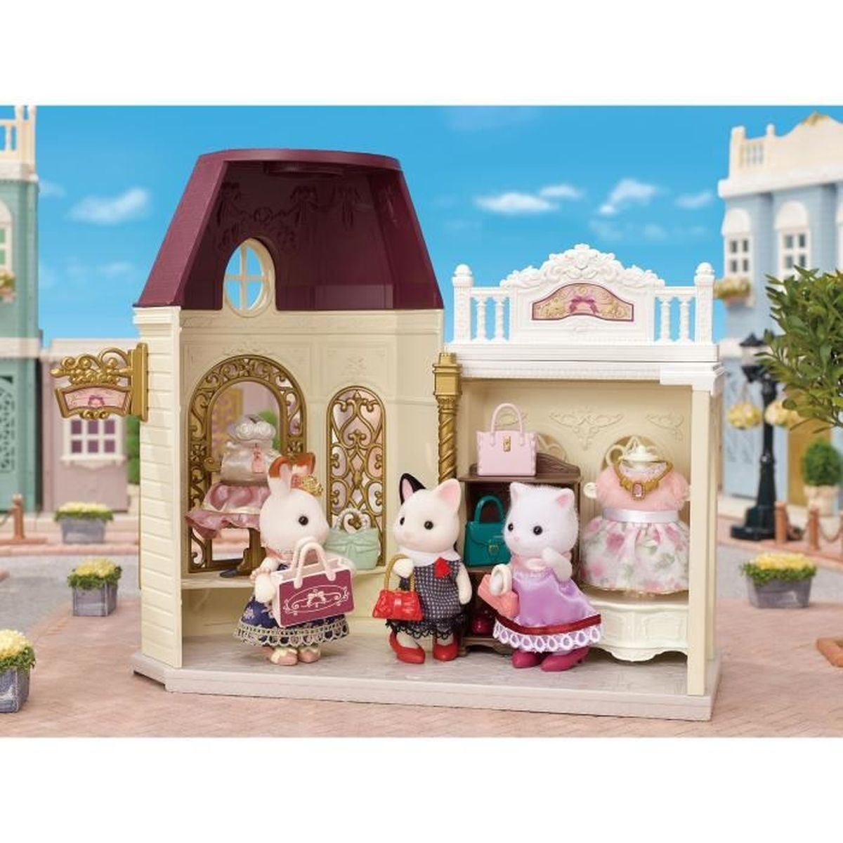 Sylvanian Families Figuren in einem Laden mit Kleidern und Taschen.