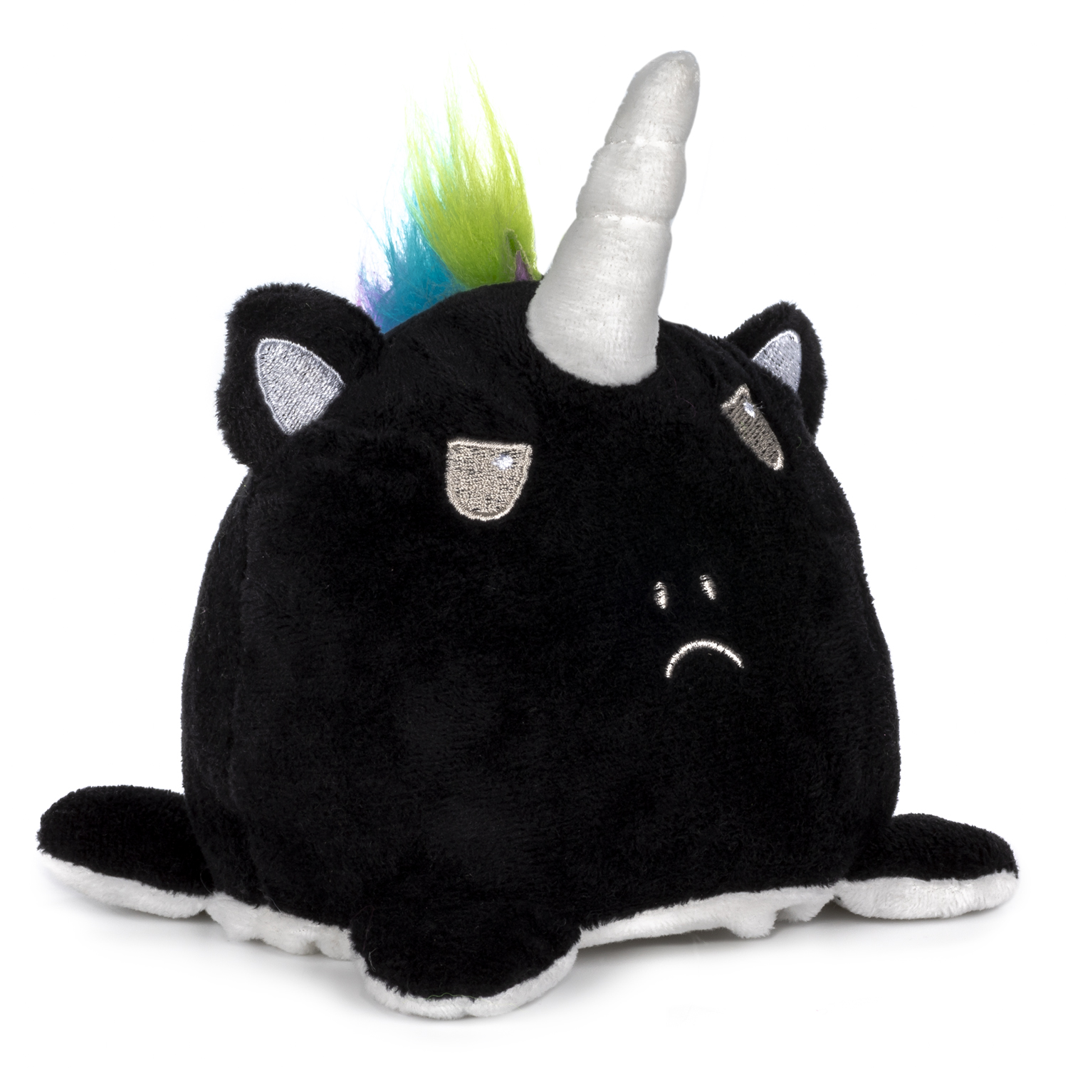 Unicornio de peluche negro con crin arcoíris, cuerno blanco y cara triste.