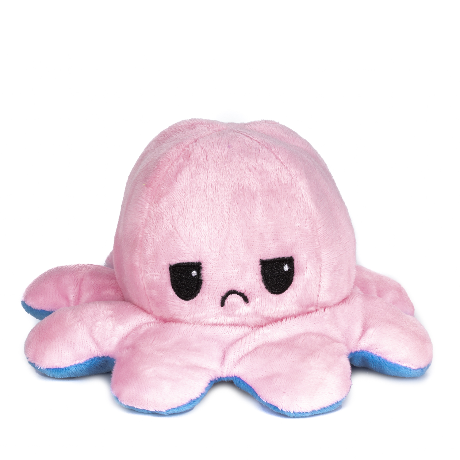 Un pulpo de peluche rosa con detalles azules y cara triste.