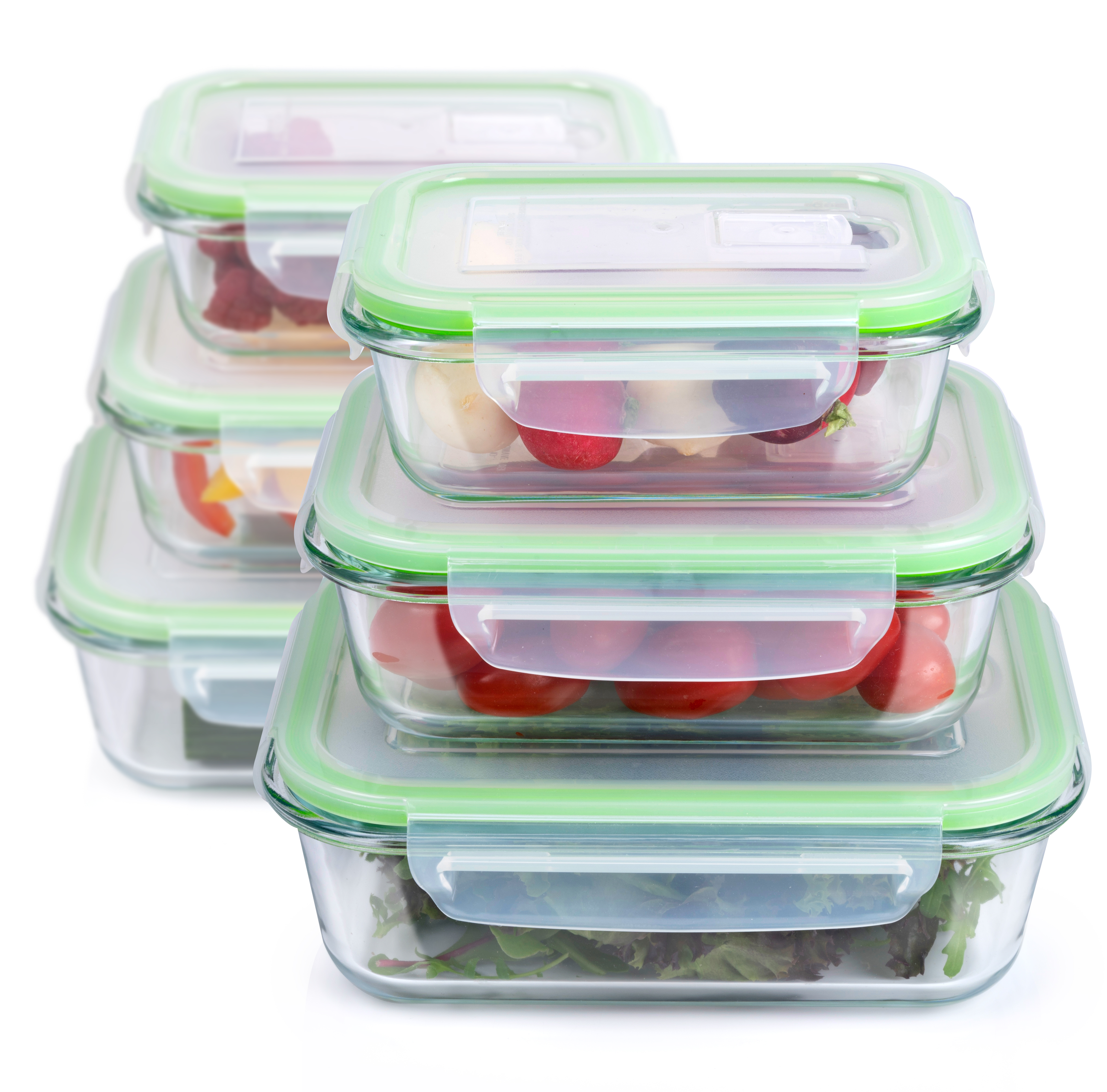 Stacked glass containers with green lids, filled with food items.