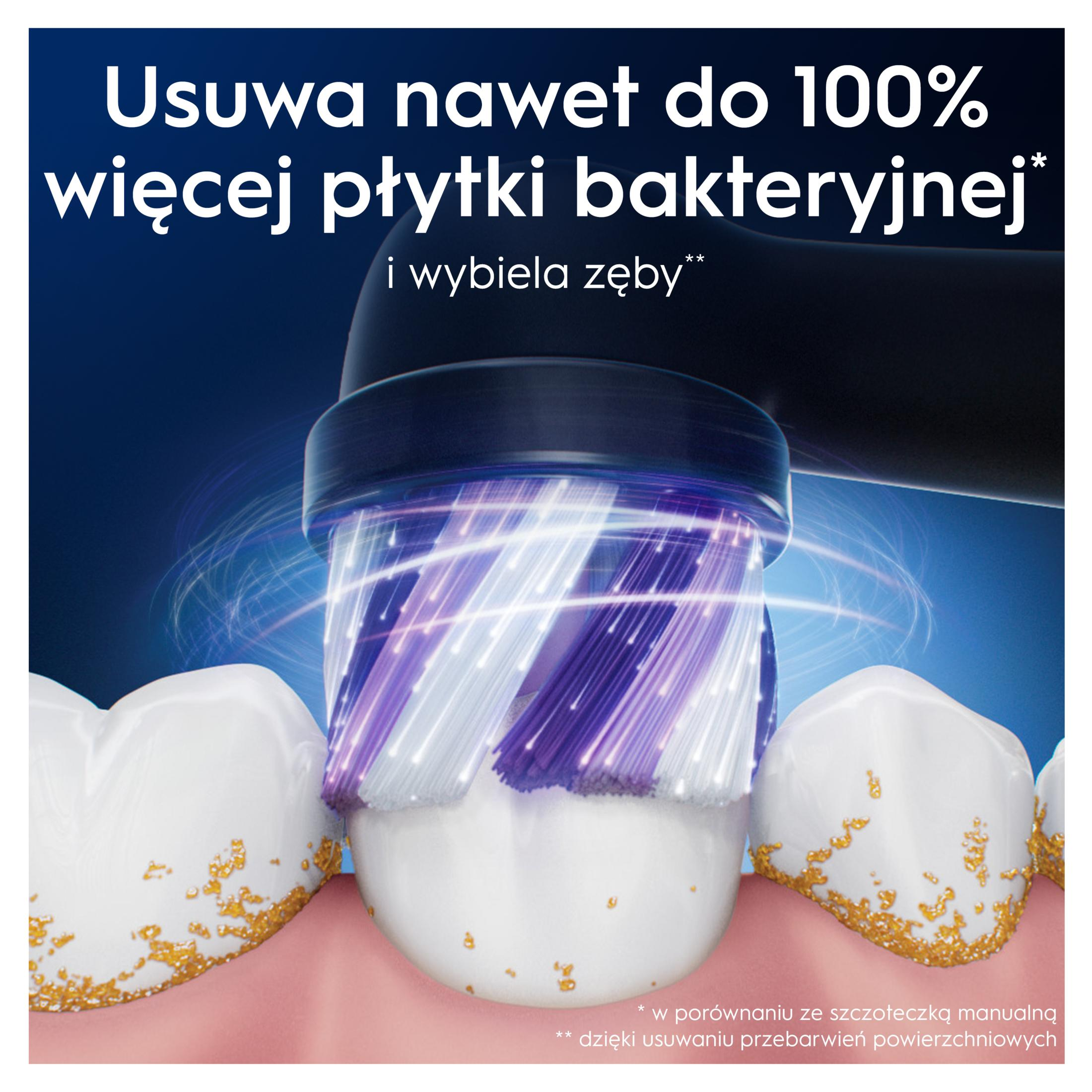 Uno spazzolino elettrico pulisce i denti con macchie gialle.