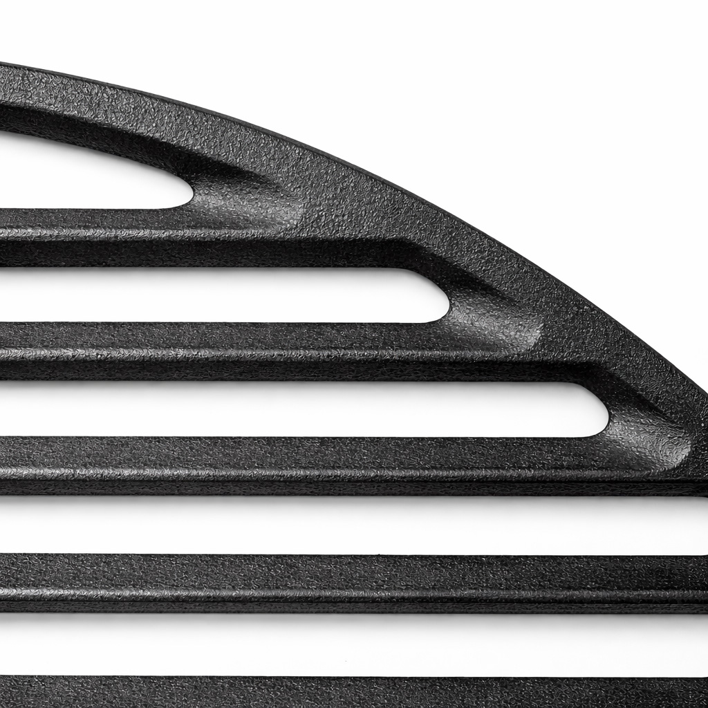 Black grate with three horizontal bars and oval cutouts.