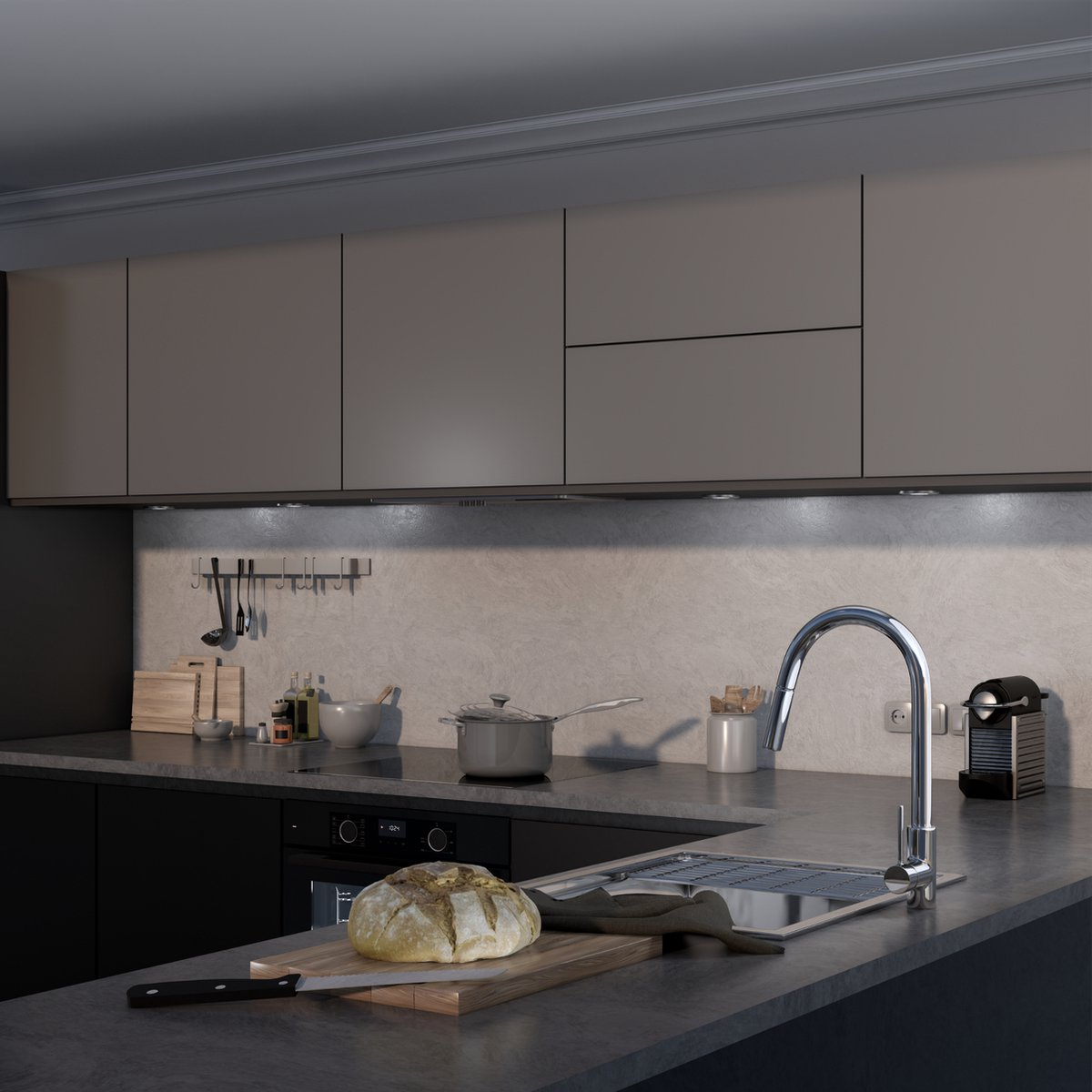 Een moderne keuken met donkere aanrechtbladen, een gootsteen, een fornuis en een koffiezetapparaat.
