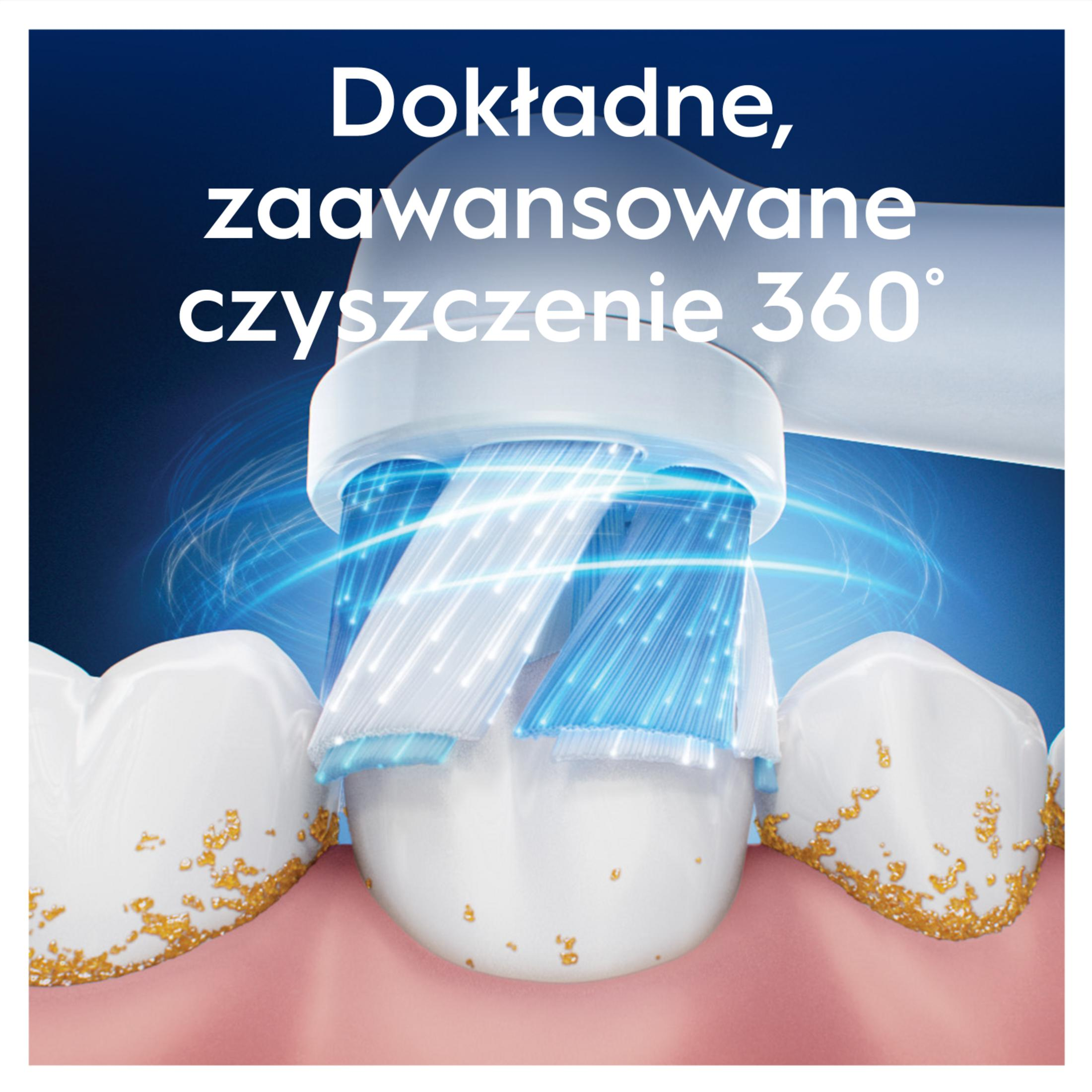 Szczoteczka elektryczna czyści zęby niebieskimi i białymi włóknami.