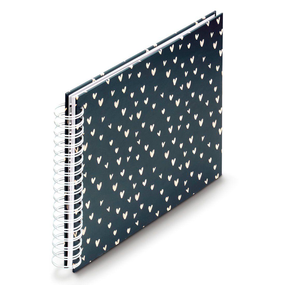 Ciemnoniebieski notatnik z małym wzorem serca i białym grzbietem spiralnym.