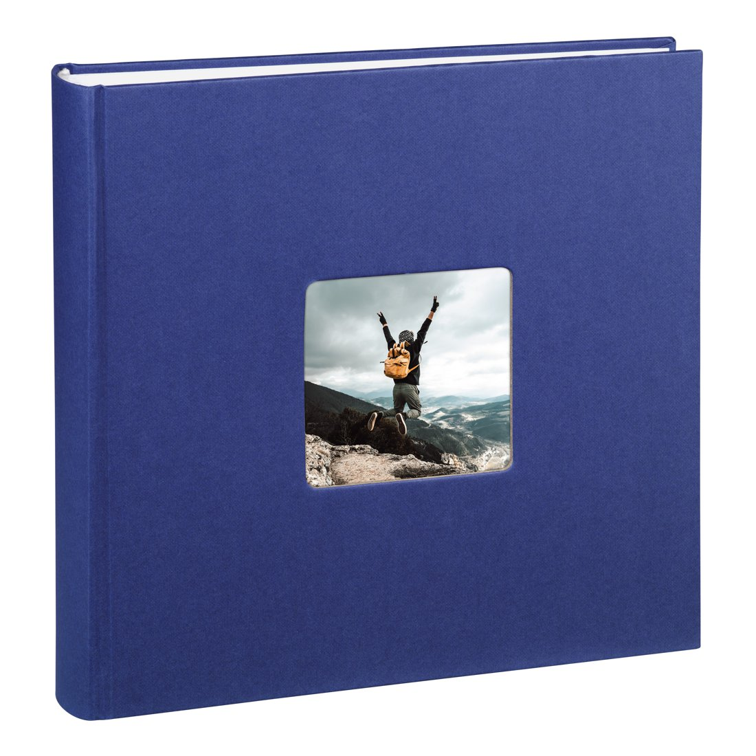 Niebieski album na zdjęcia z oknem pokazującym skaczącego turystę.