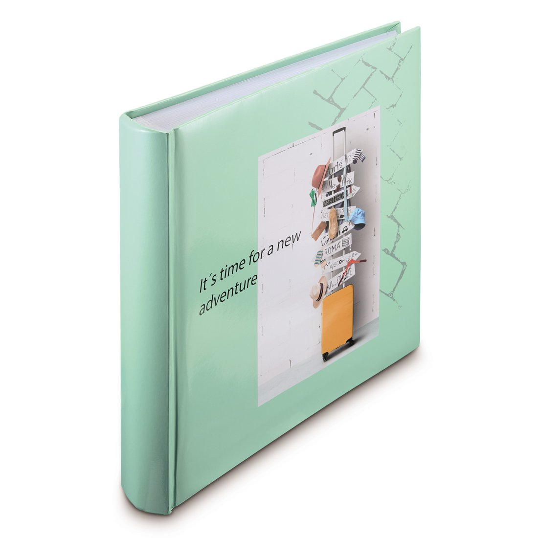 Jasnozielona okładka albumu z motywem podróżniczym. Napis: 'It's time for a new adventure'.