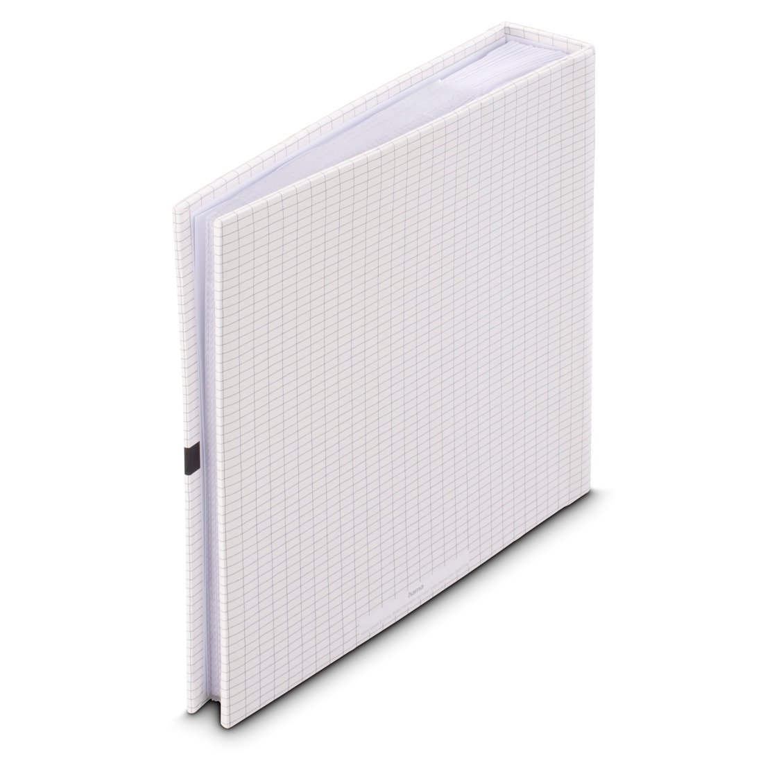 Biały notes w kratkę, leżący na boku.