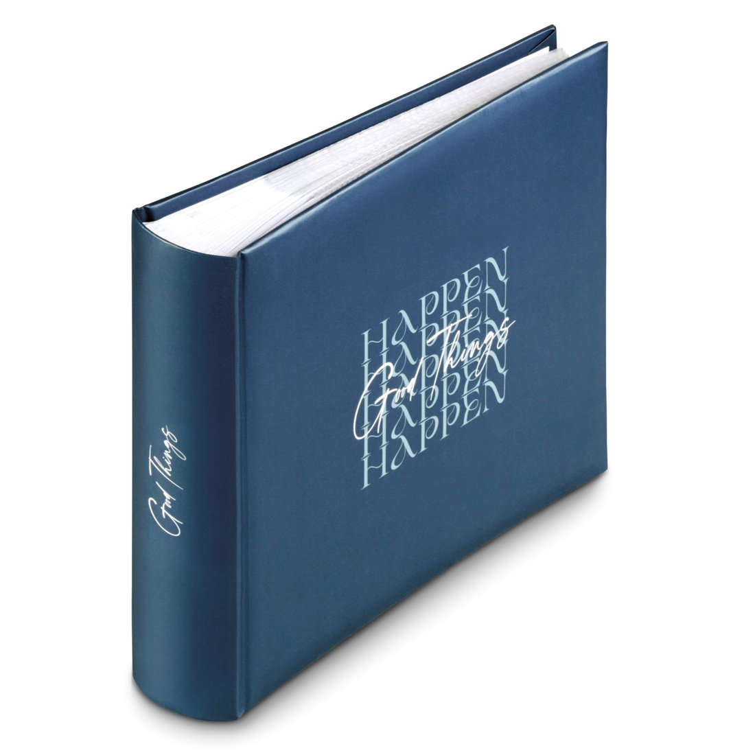 Niebieska książka z napisem 'Good Things Happen' na okładce.