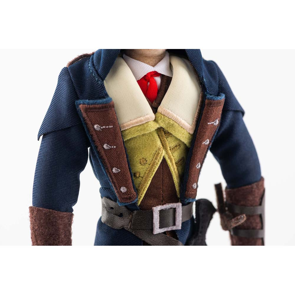 Un uomo in cappotto blu, camicia bianca, cravatta rossa e gilet.