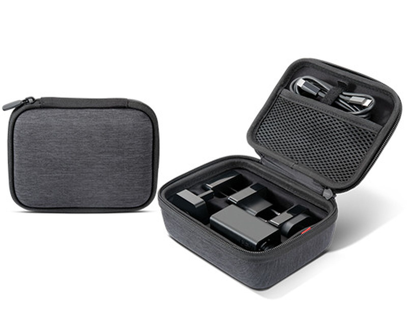 Szara torba, otwarta, z kablem ładującym i akcesoriami w środku.