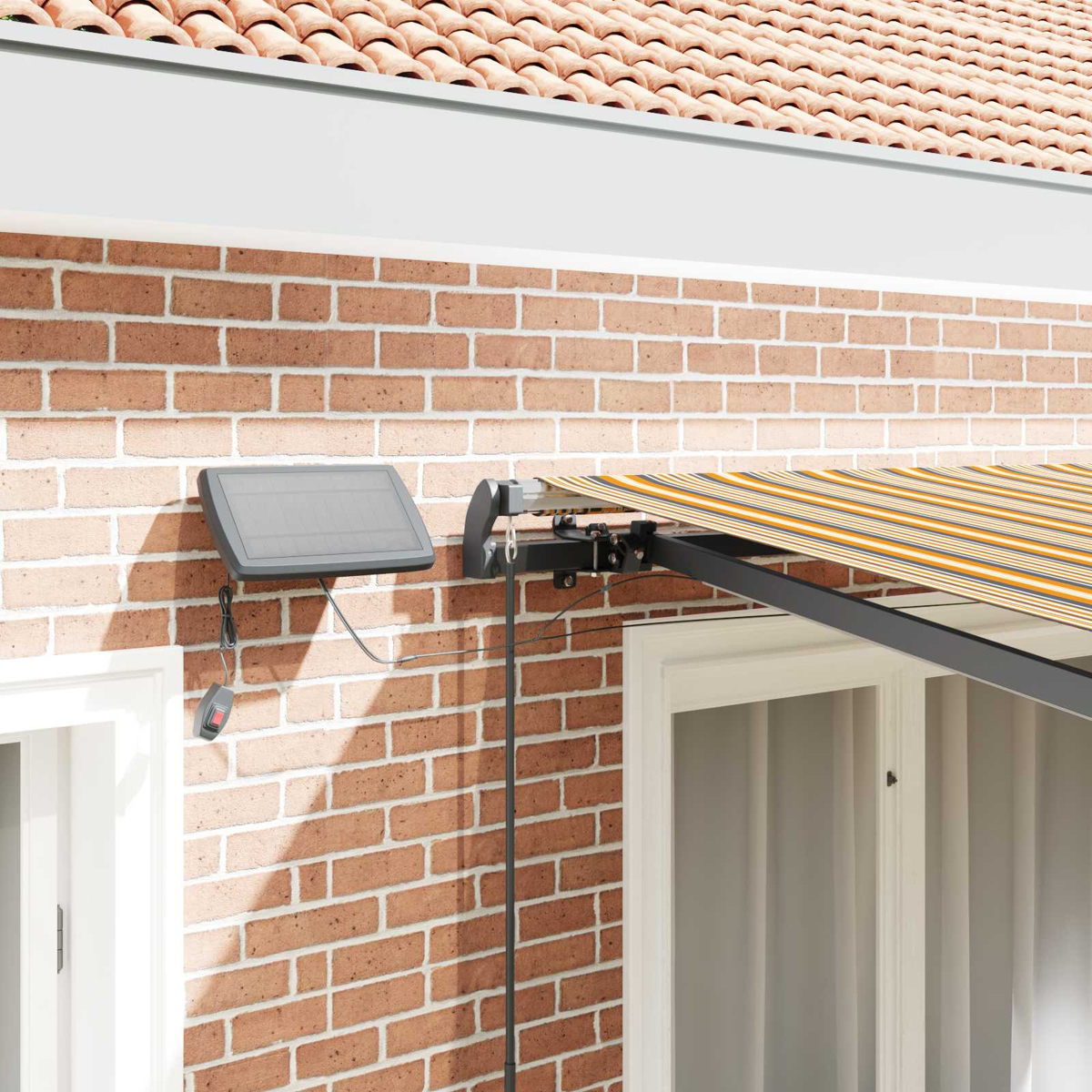 Ein Sonnensegel mit Solarpanel und Fernbedienung an einer Ziegelwand.