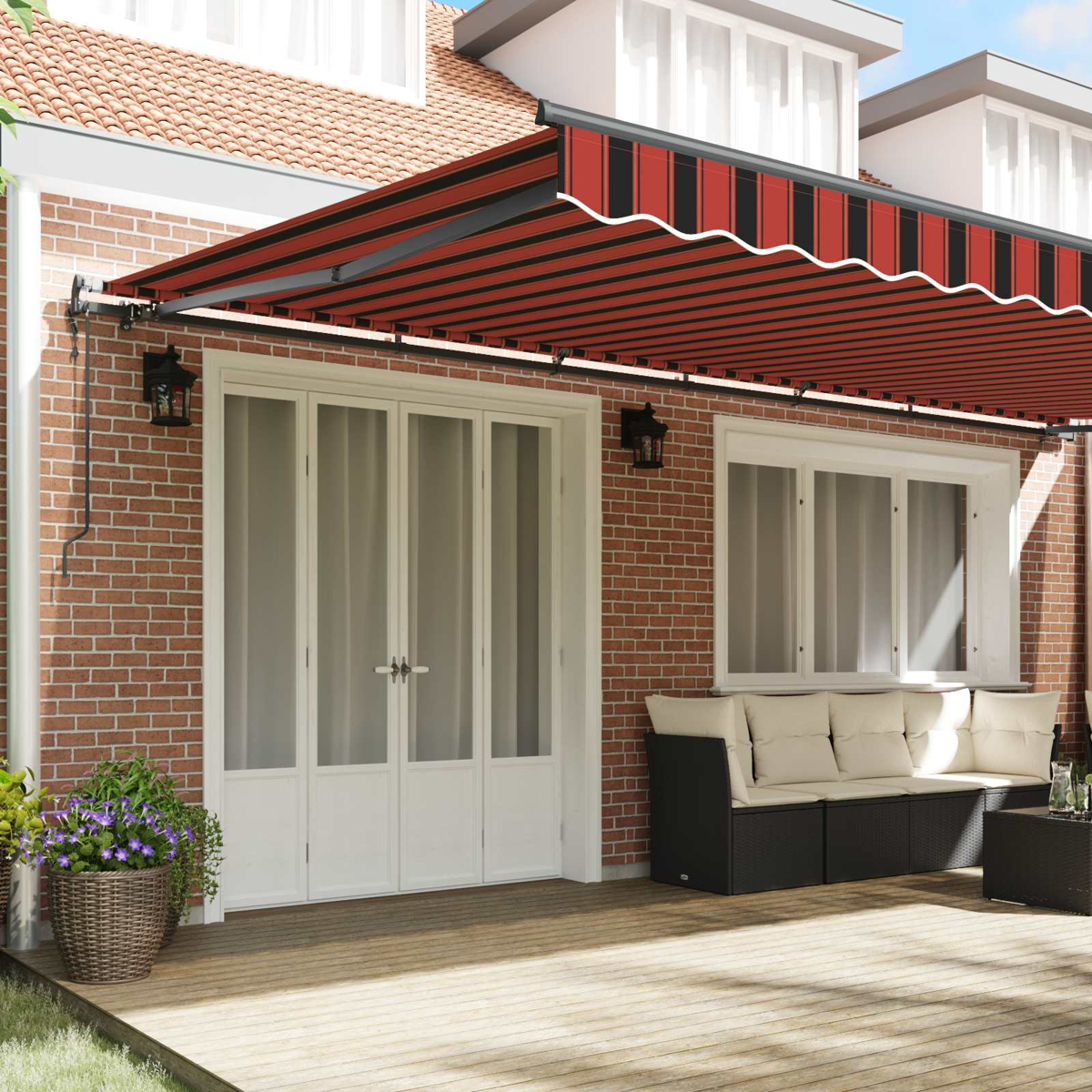 Ein rotes und schwarzes Markisenzelt über einer Terrasse mit Möbeln.