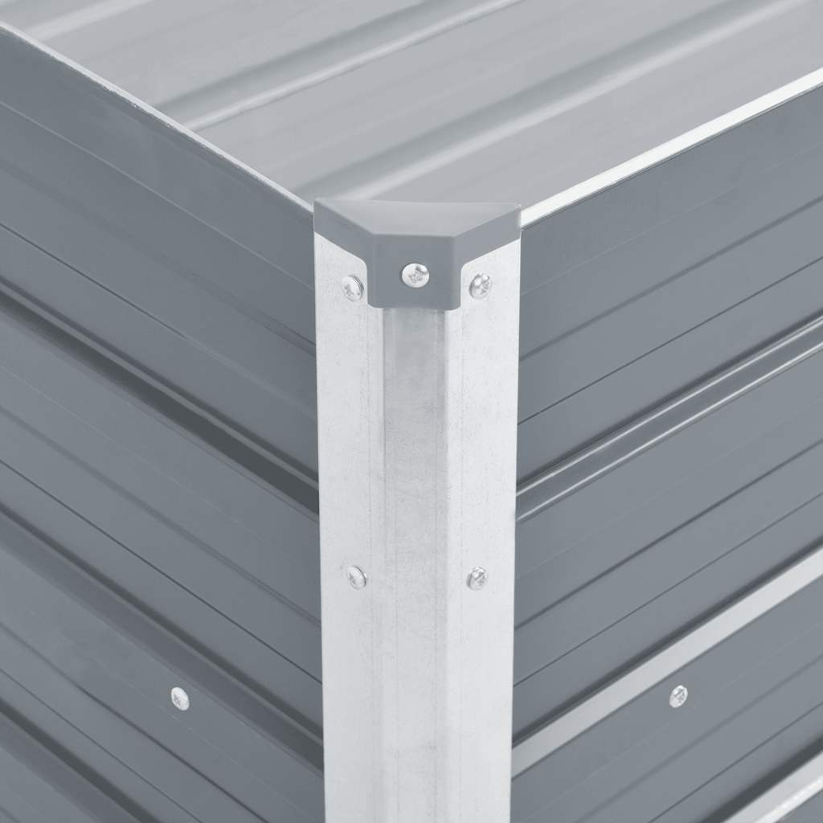 Detailansicht einer grauen Metallbox-Ecke mit silbernem Pfosten und grauer Kappe.