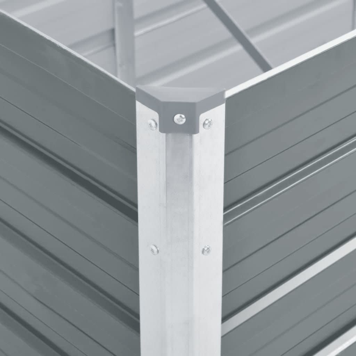 Nahaufnahme einer Ecke eines grauen Metall-Hochbeets mit silbernen Stützen.