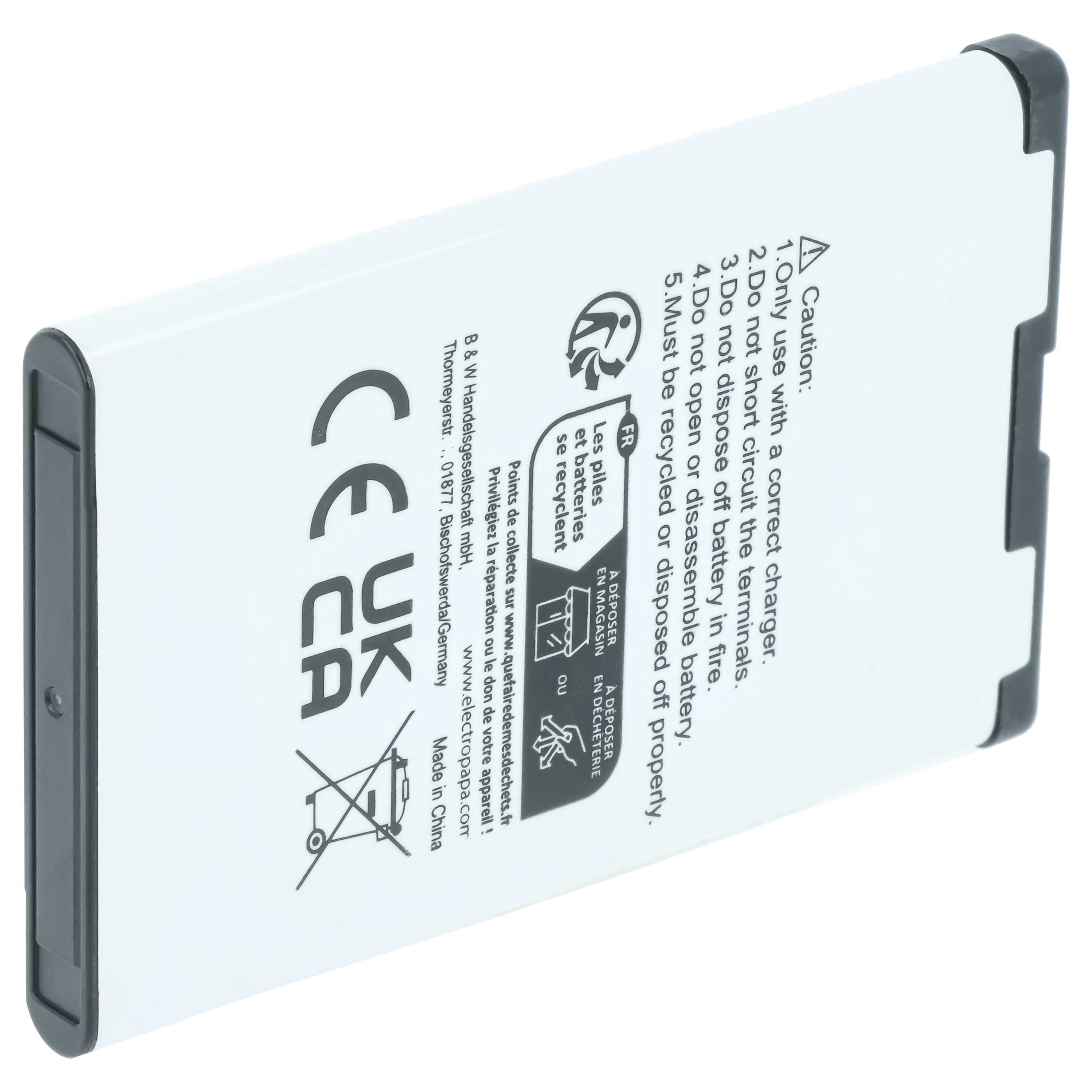 Weiße Batterie mit schwarzen Kanten und Warnhinweisen.
