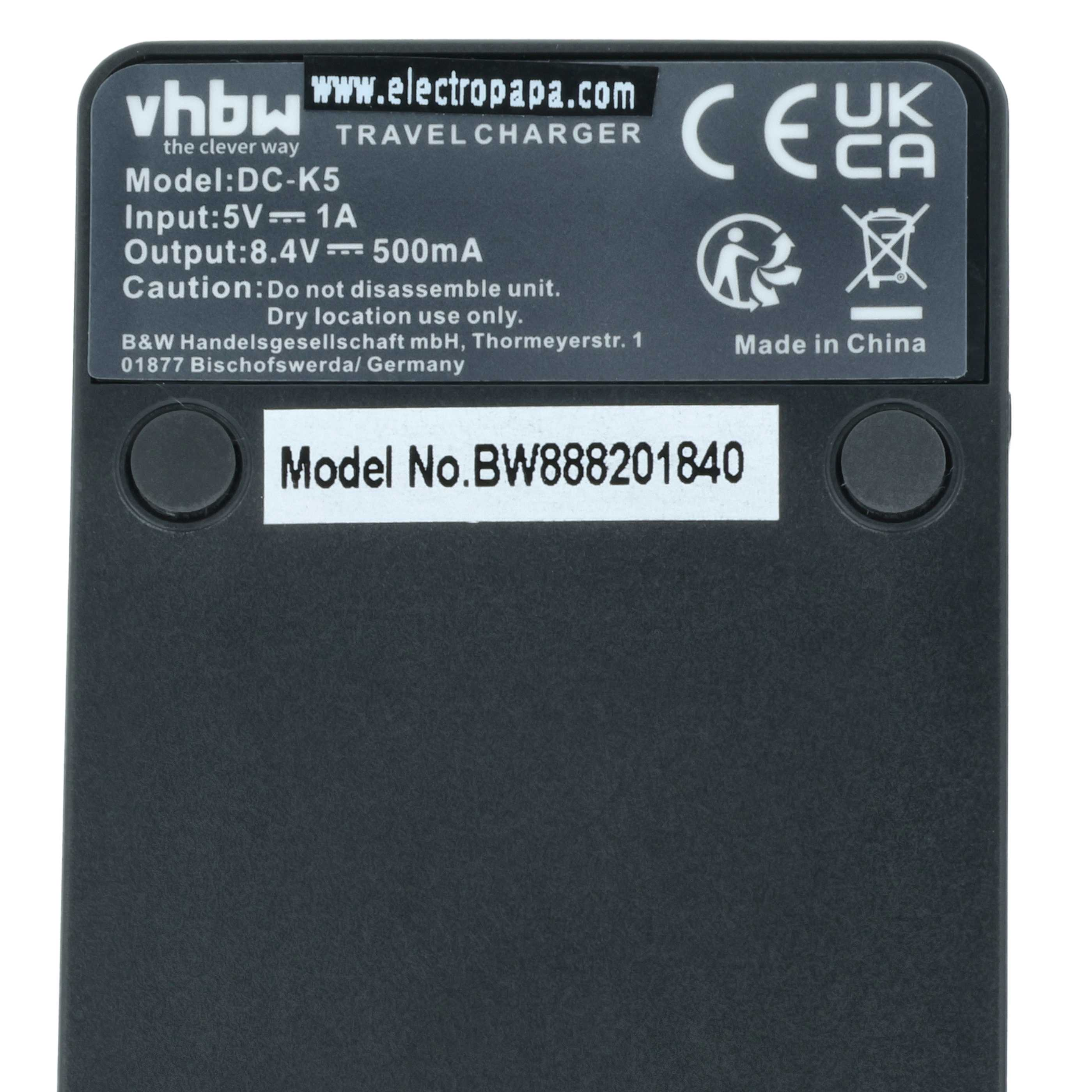 Reiseadapter mit Modell DC-K5, Eingabe 5V 1A, Ausgabe 8.4V 500mA. Made in China.