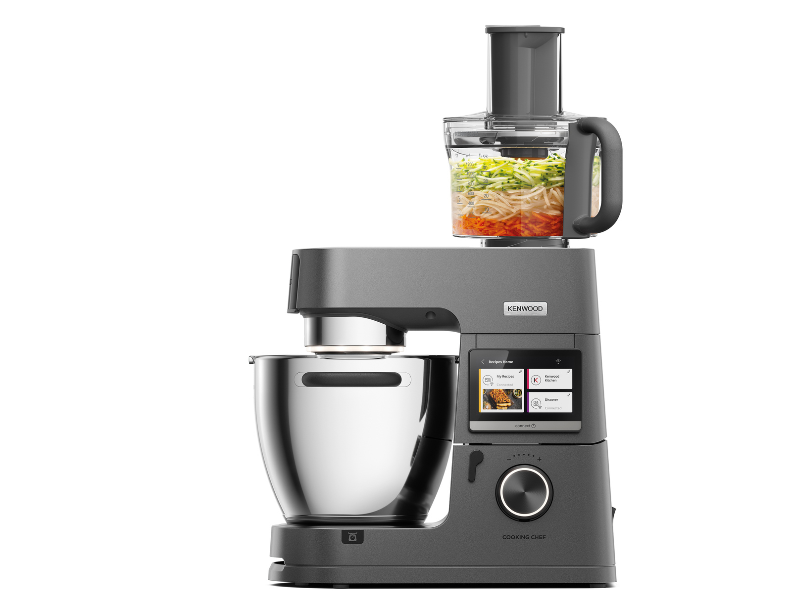 Grauer Kenwood Küchenmaschine mit Schnitzelwerk und gefülltem Behälter.
