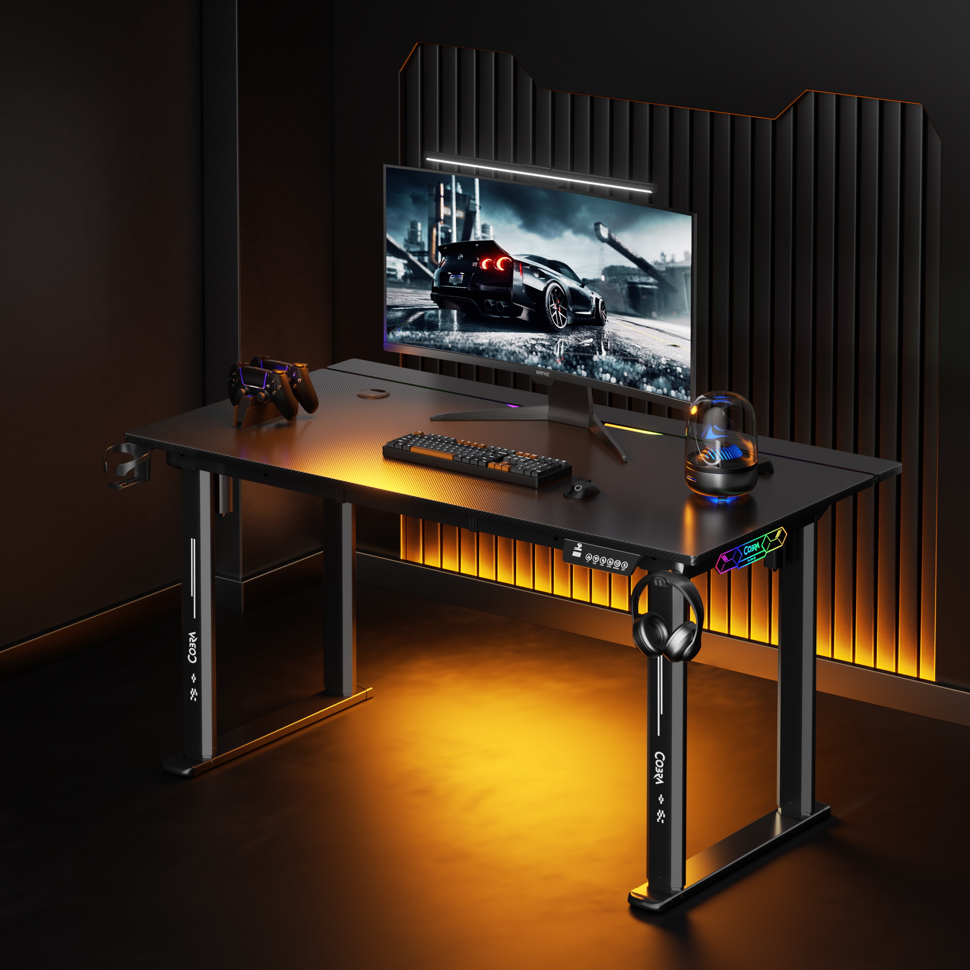 Czarny biurko ze sprzętem komputerowym, oświetlone od dołu.